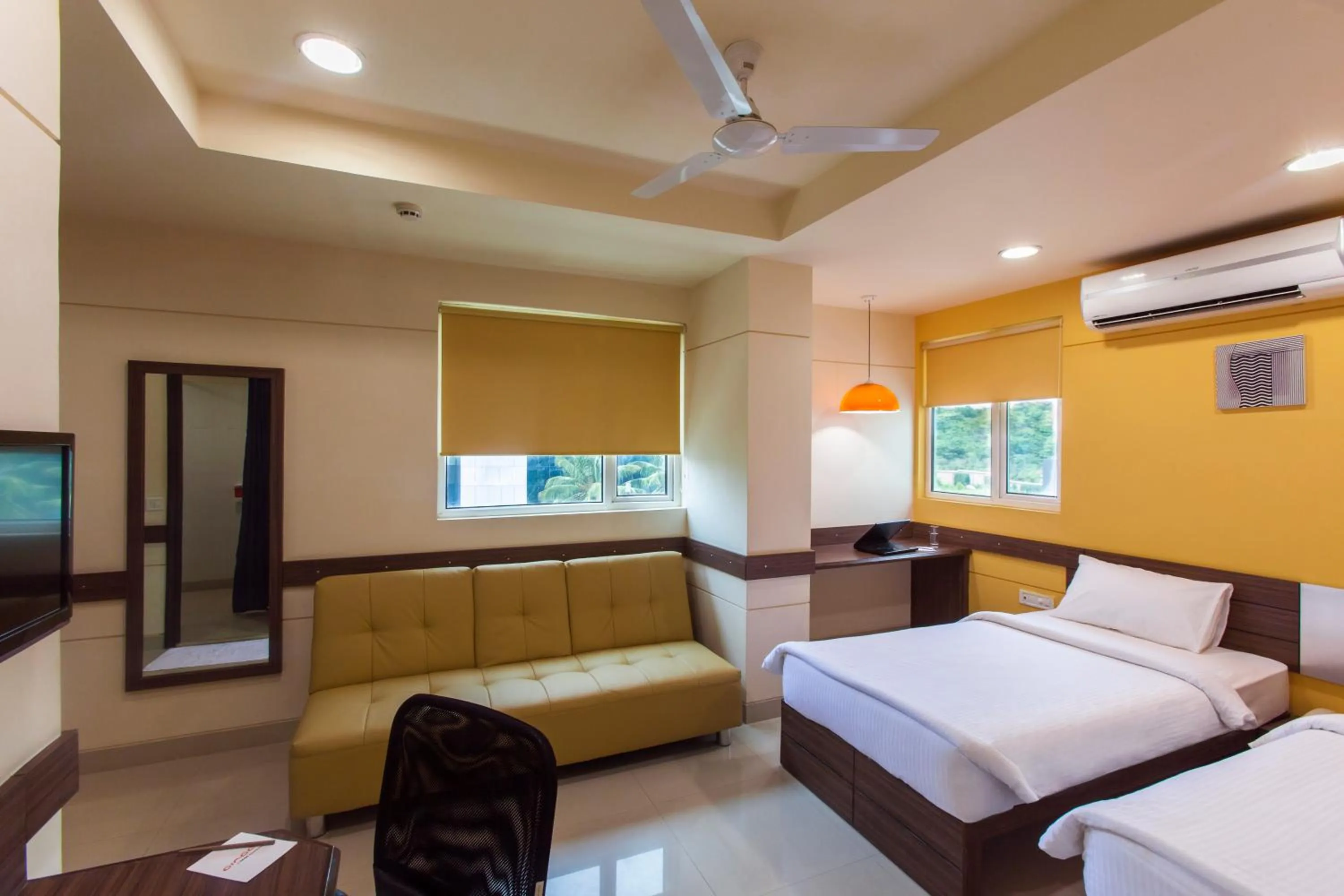 Photo of the whole room, Bed in Ginger Nashik