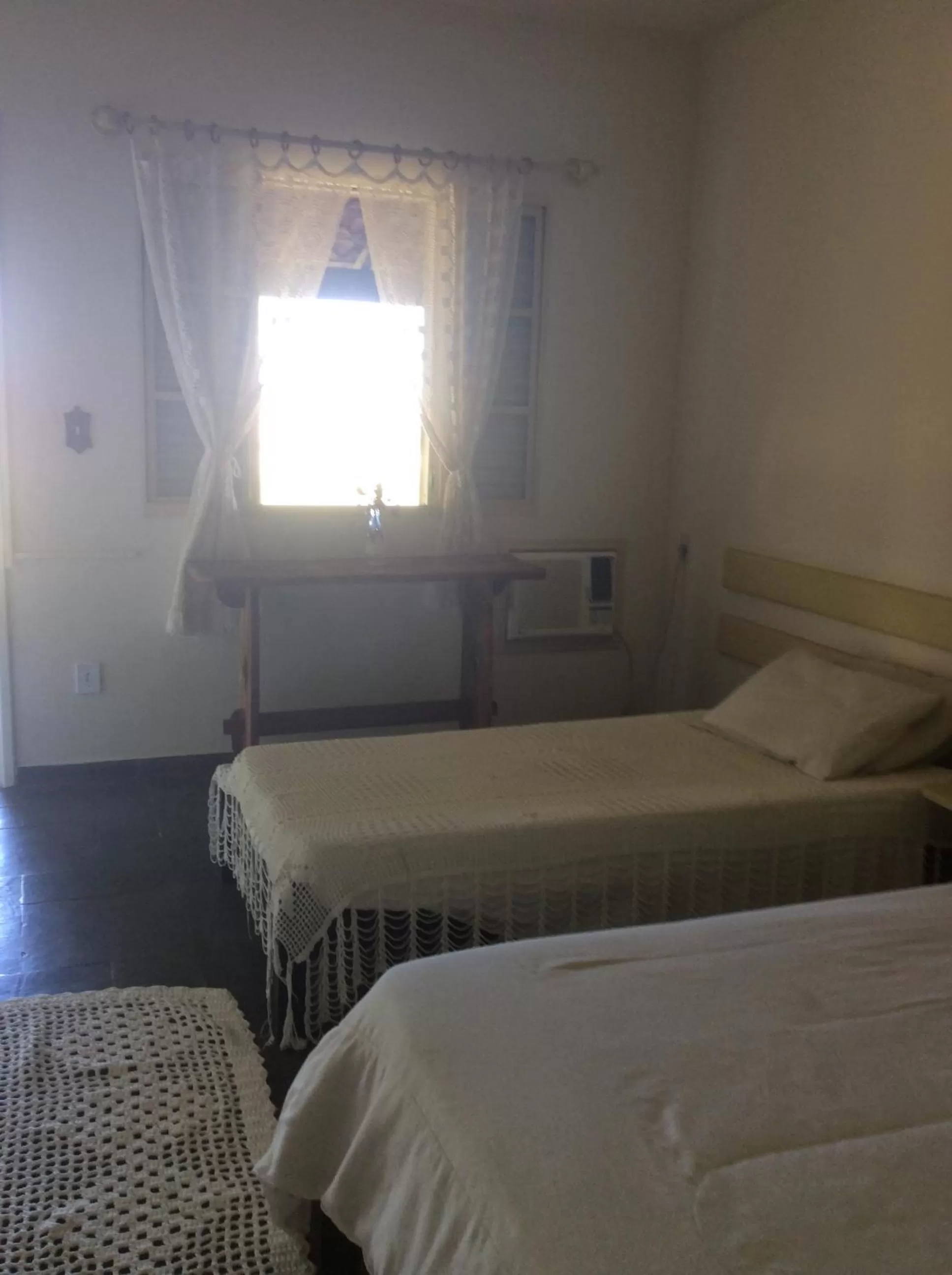 Bed in Pousada Flor da Serra