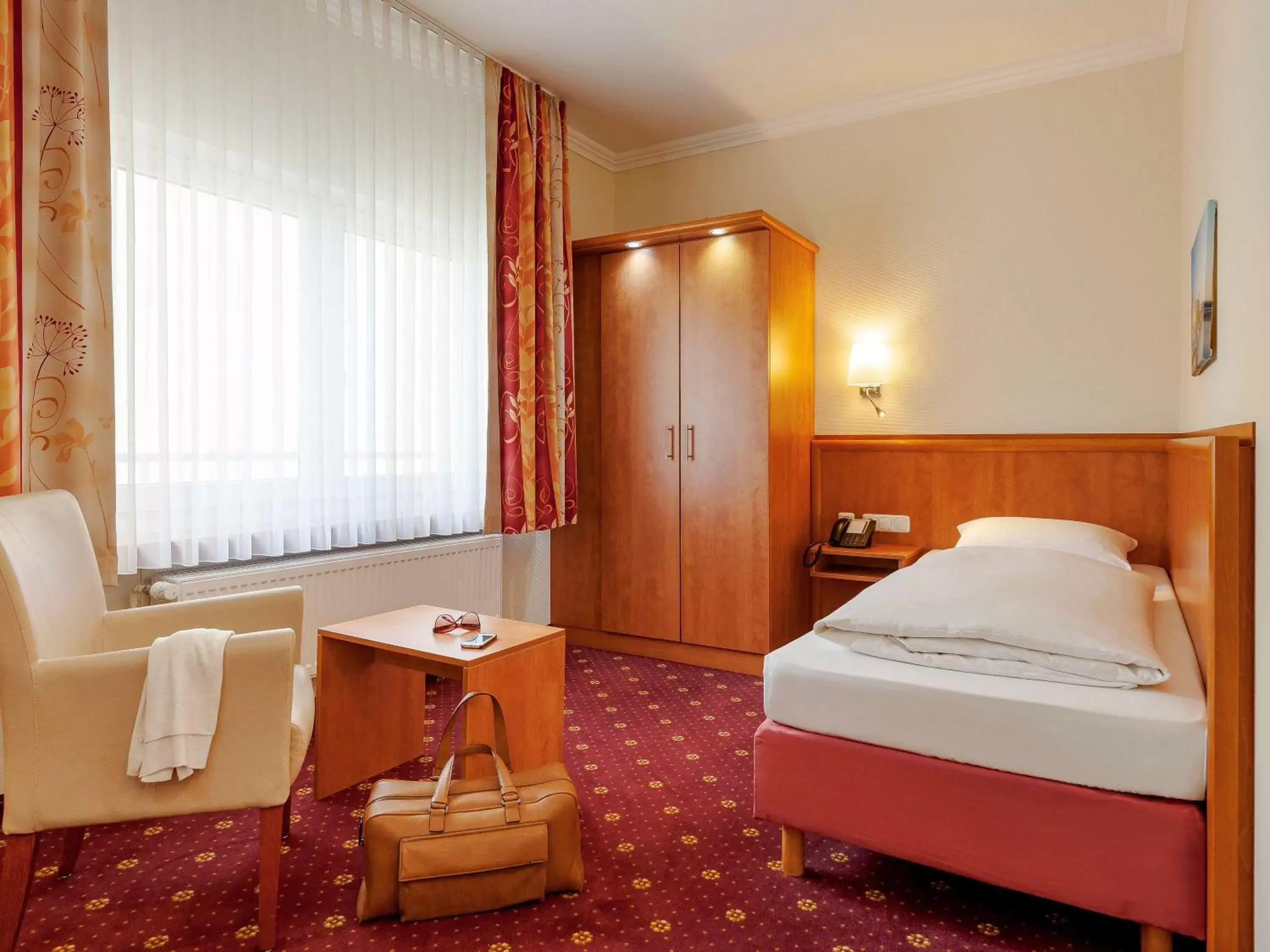 Photo of the whole room in Mercure Hotel Luebeck City Center