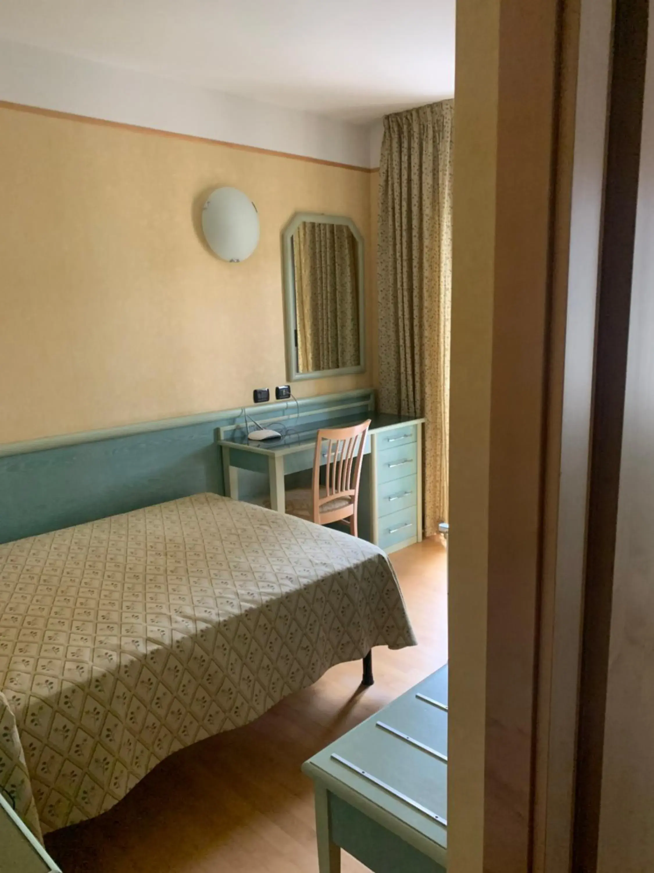 Bedroom in Hotel Residence Mondial