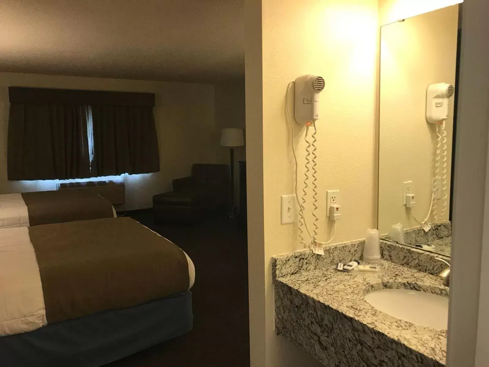 Bed, Bathroom in AmericInn by Wyndham Hotel and Suites Long Lake