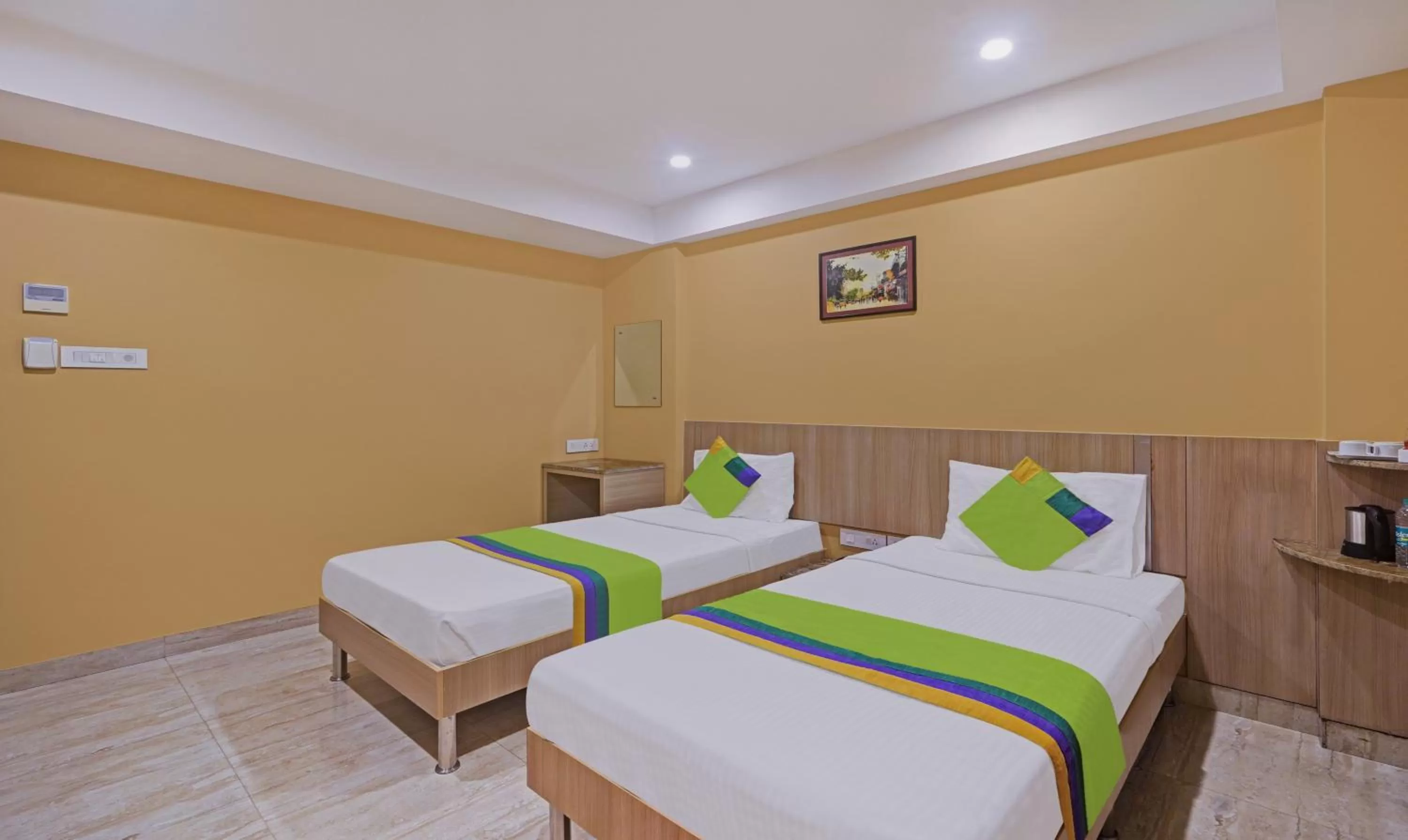 Bedroom, Bed in Treebo Fourth Avenue