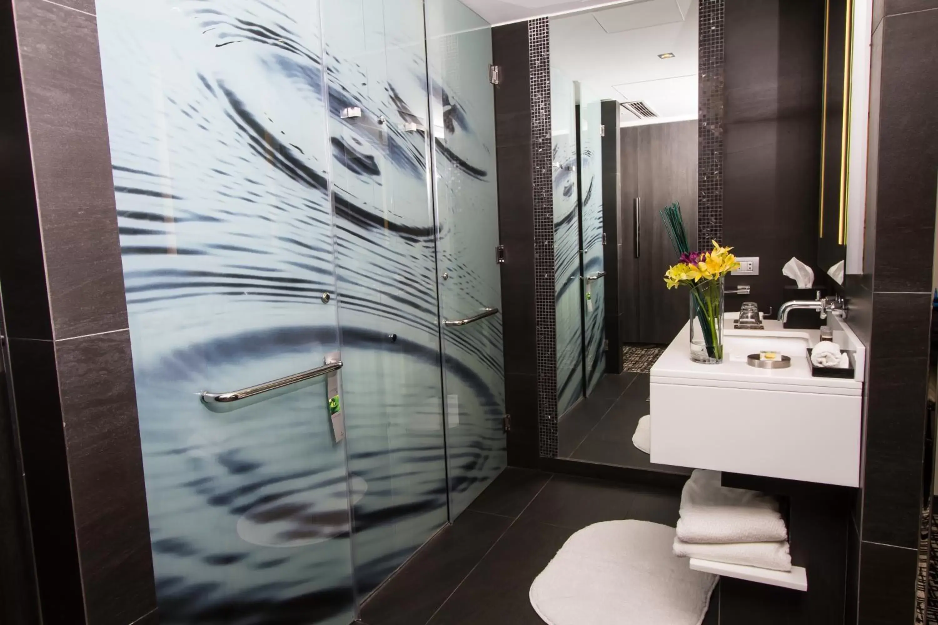 Bathroom in Renaissance Santiago by Marriott