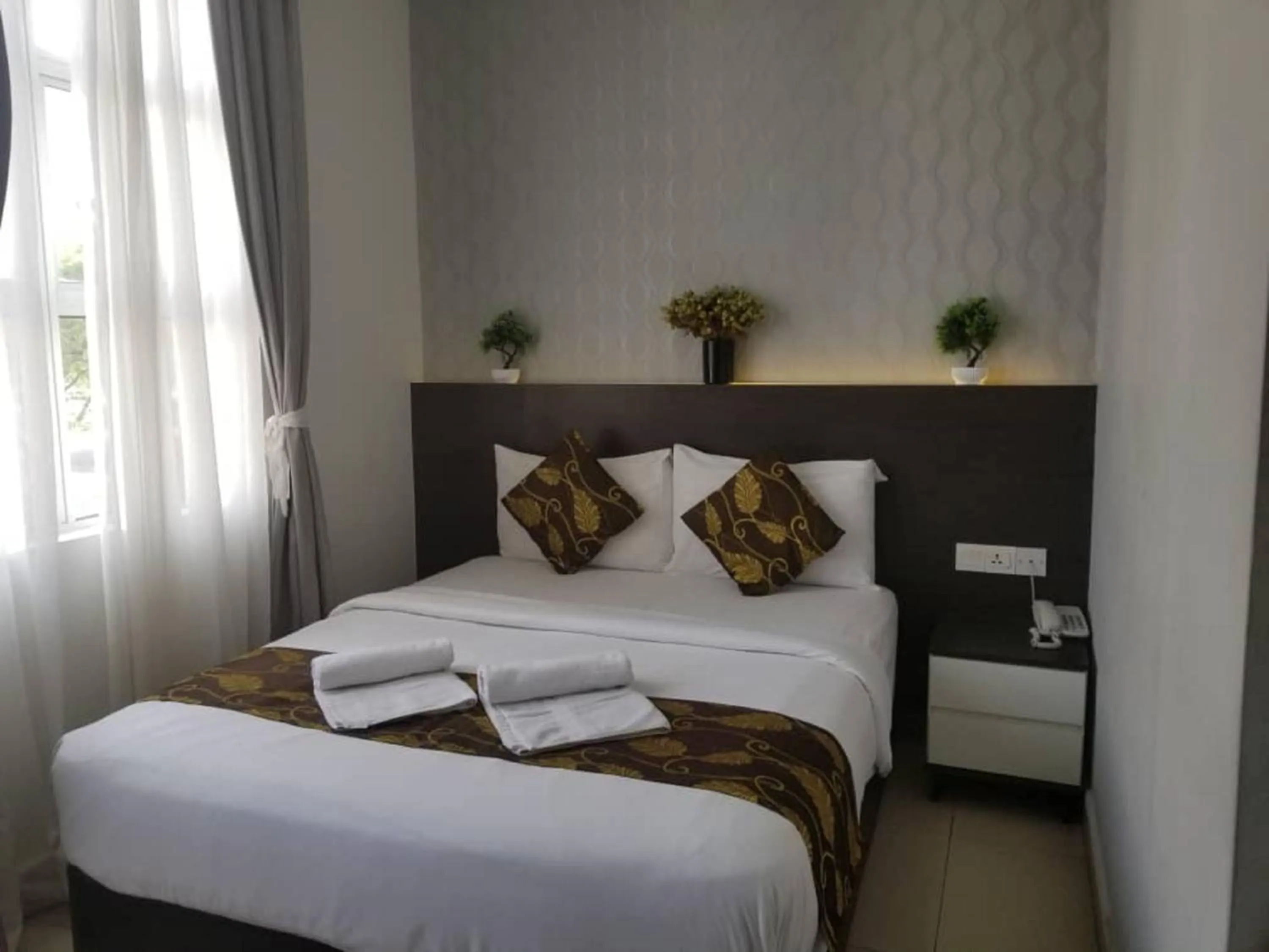 Decorative detail, Bed in D'Metro Hotel