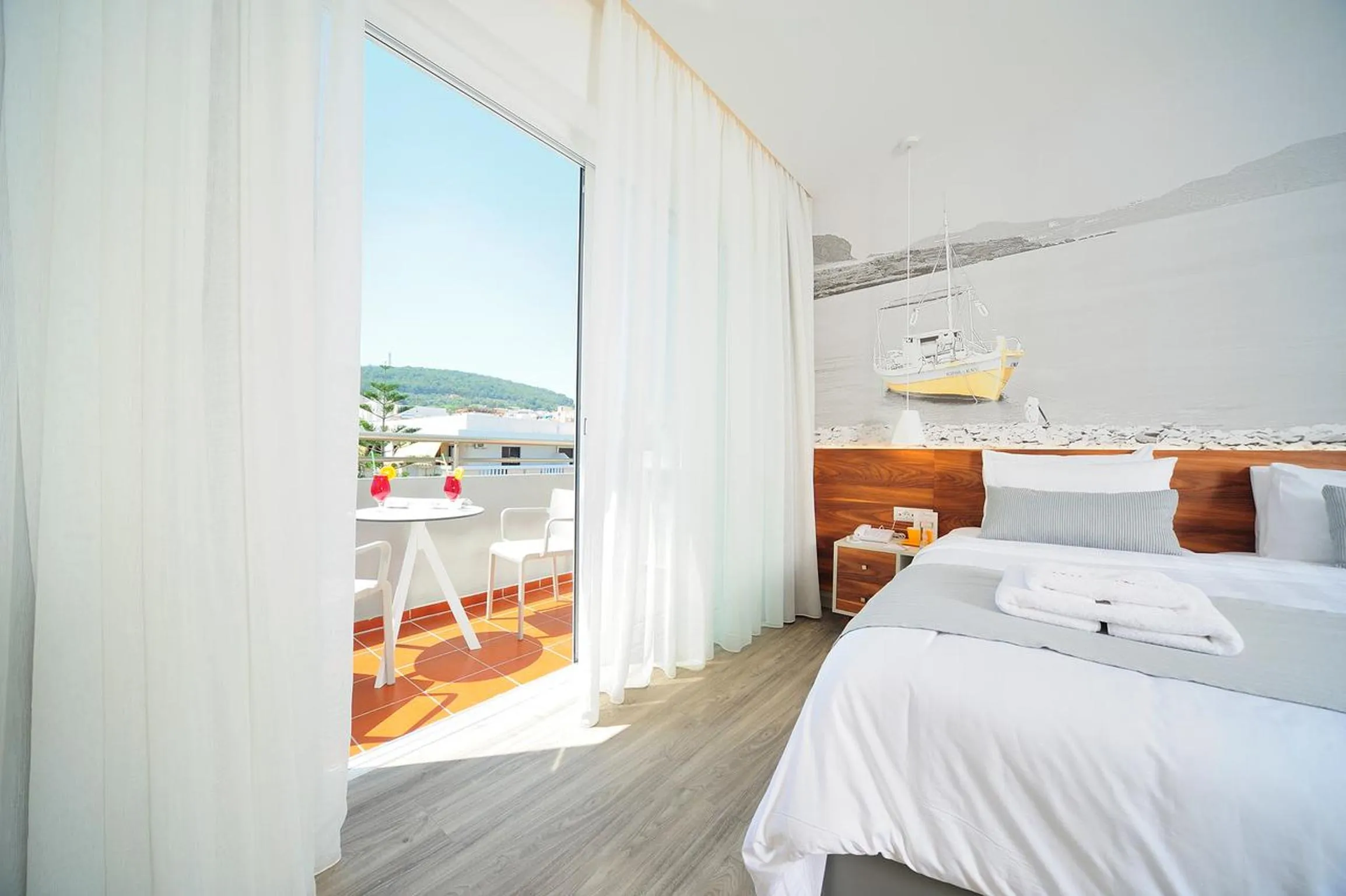 Bed in Atrium Ambiance Hotel