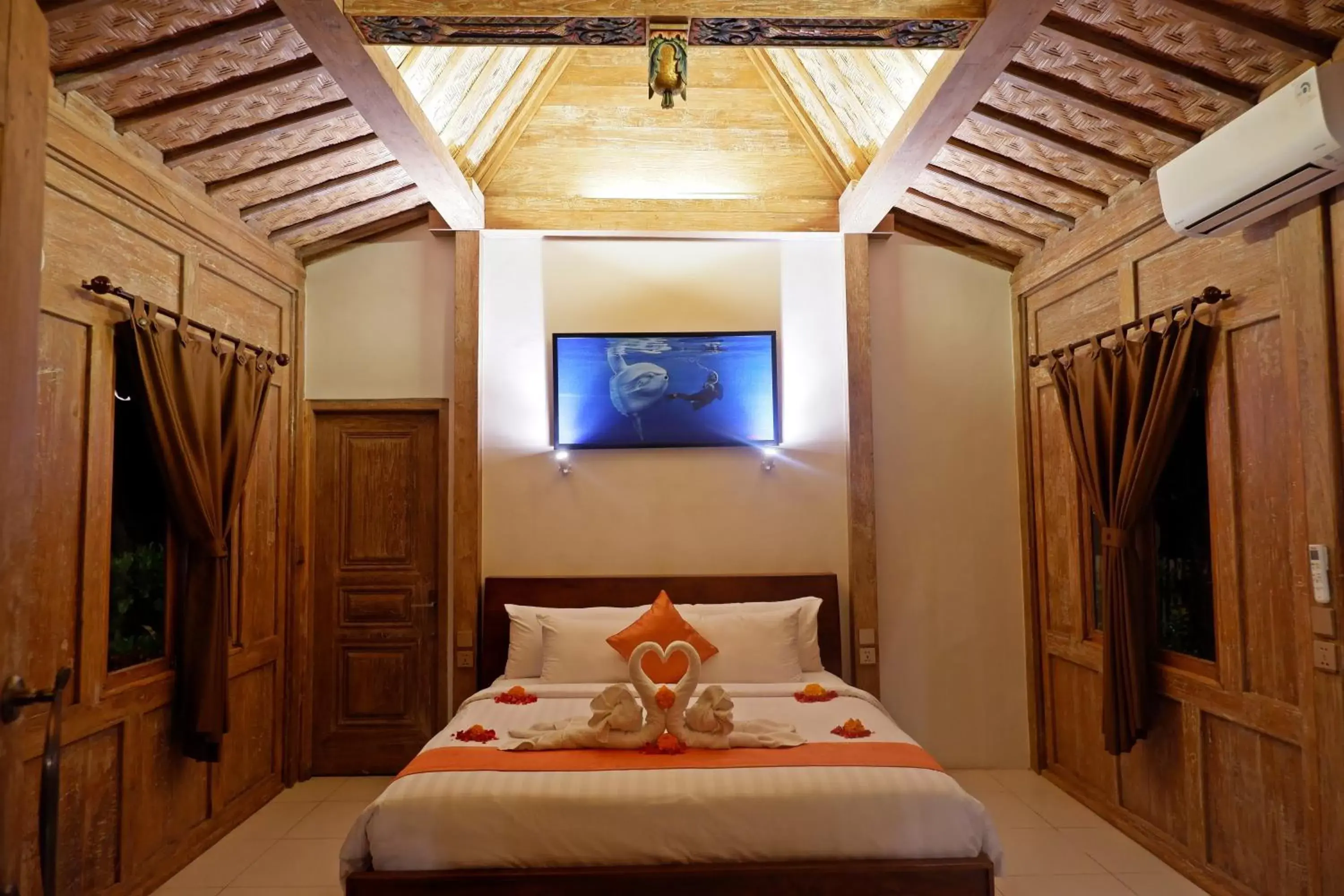 Bed in Blue Harbor Beachfront Villas & Resto Bed in Blue Harbor Beachfront Villas & Resto