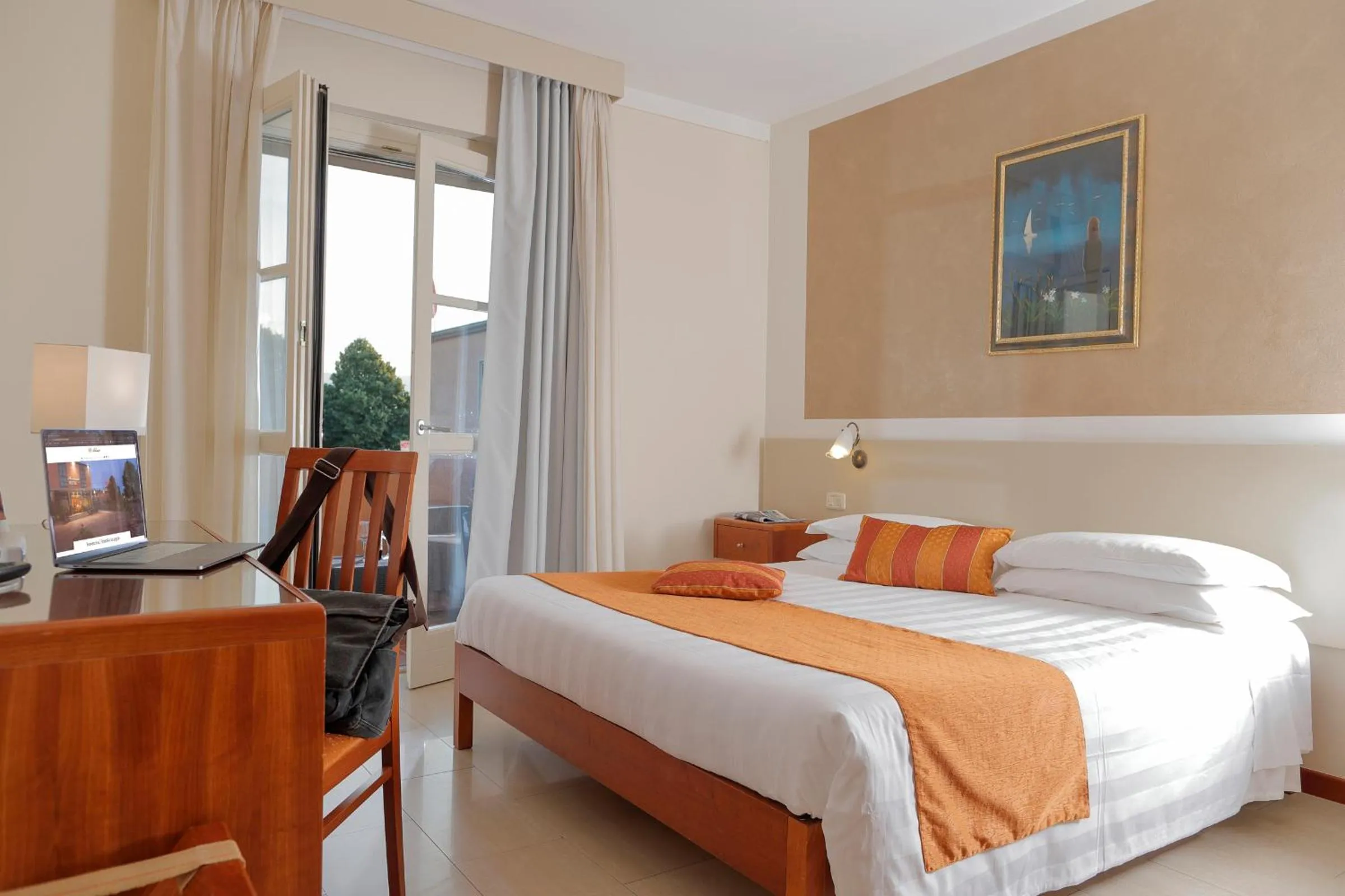 Bed in Hotel Michelangelo