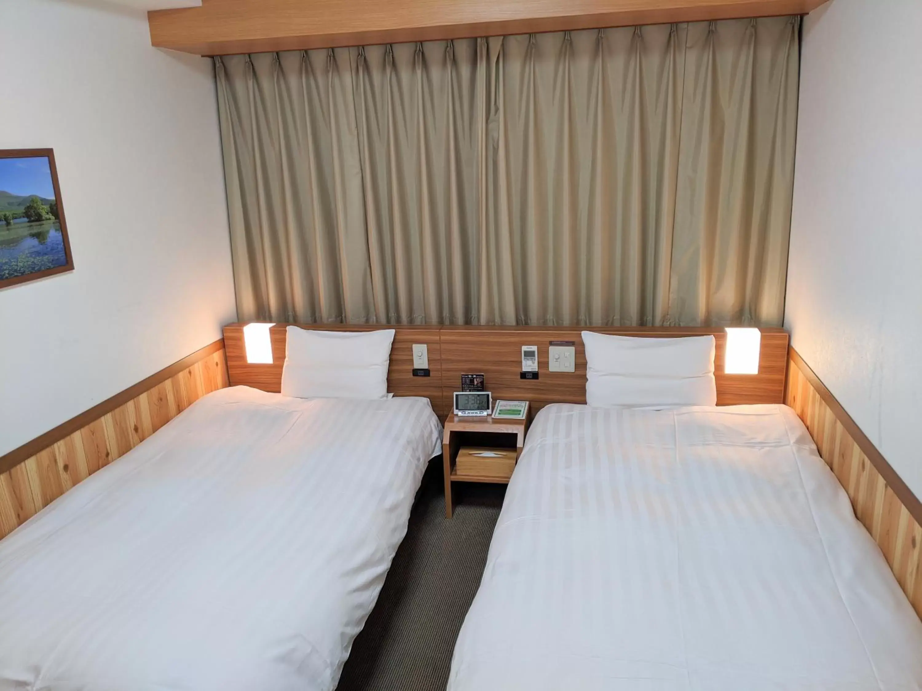 Bed in Dormy Inn Premium Sapporo