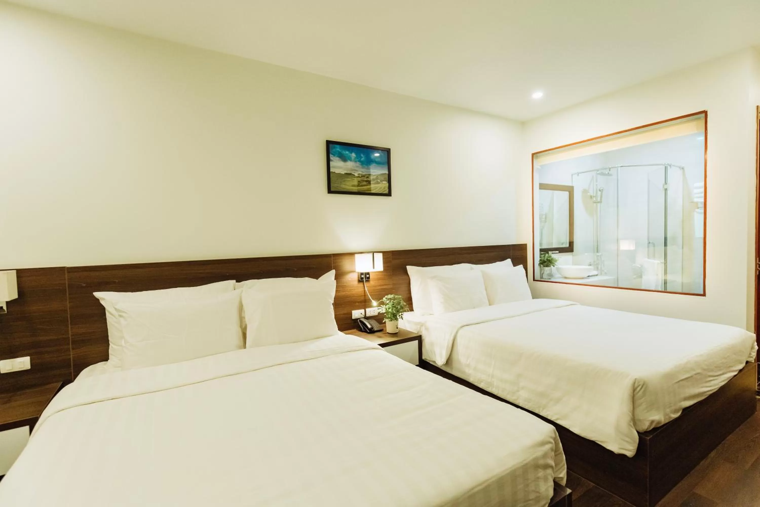 Bed in Paragon Noi bai Hotel & Pool