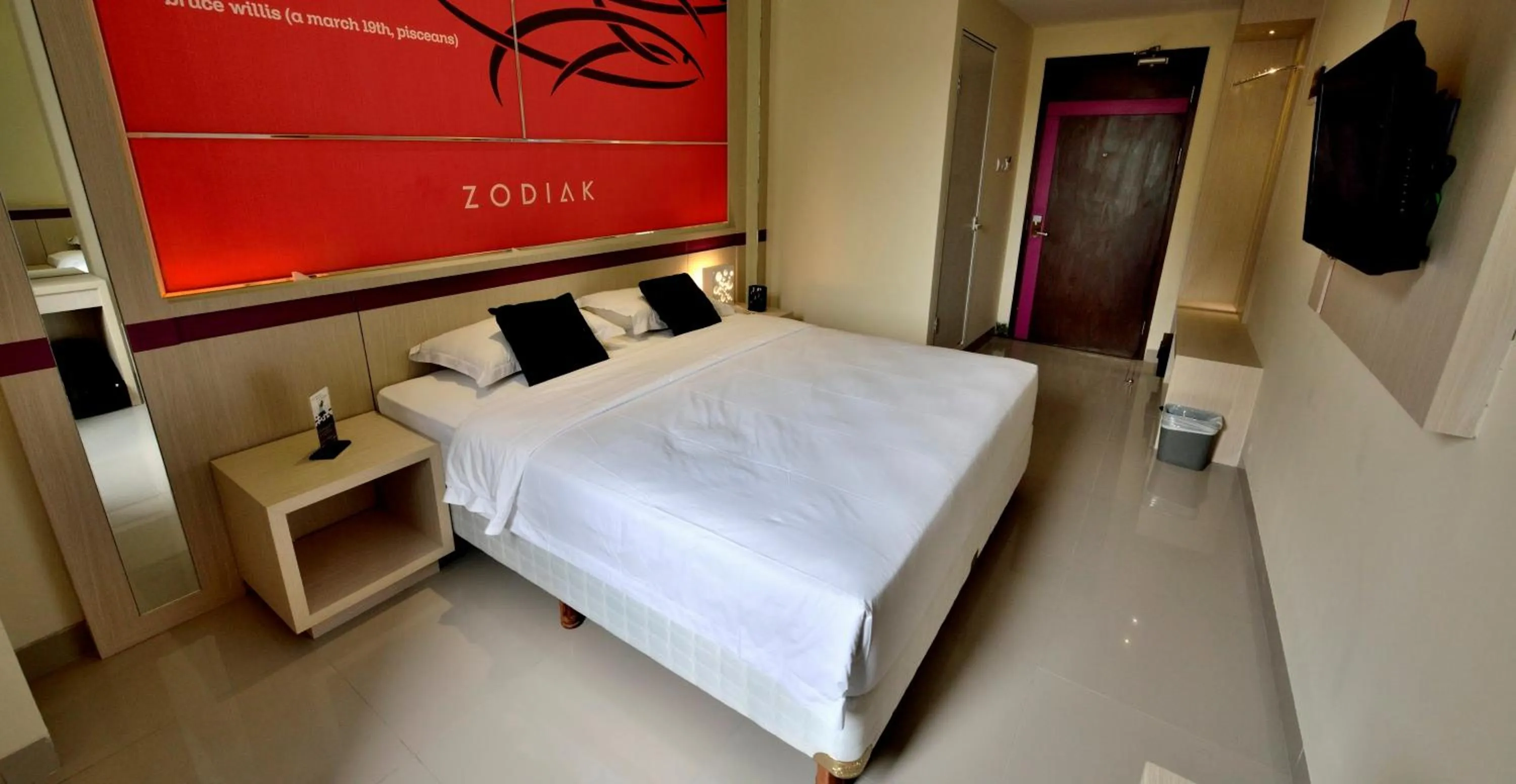 Bed in Zodiak Kebon Kawung by KAGUM Hotels