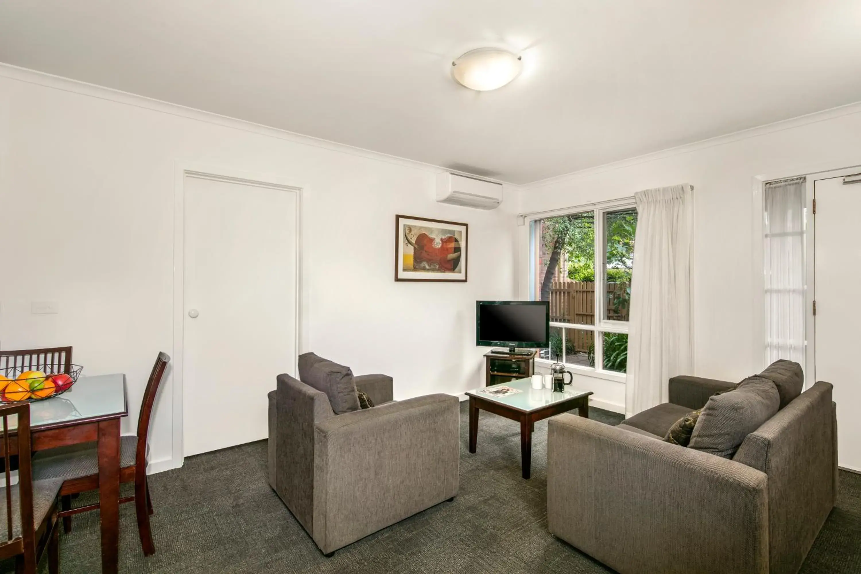 Seating Area in Comfort Apartments Royal Gardens