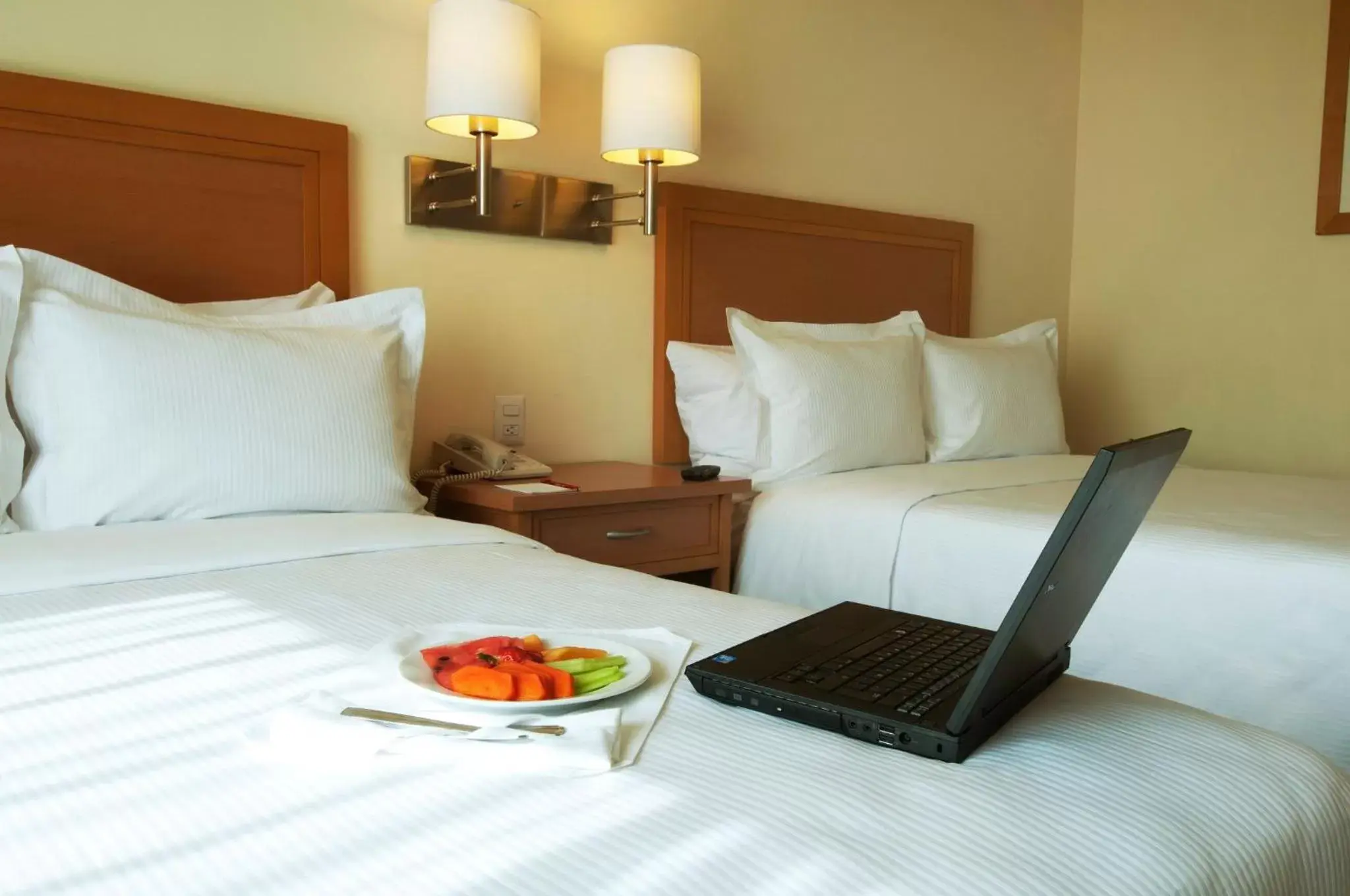 Photo of the whole room, Bed in Fiesta Inn Toluca Centro