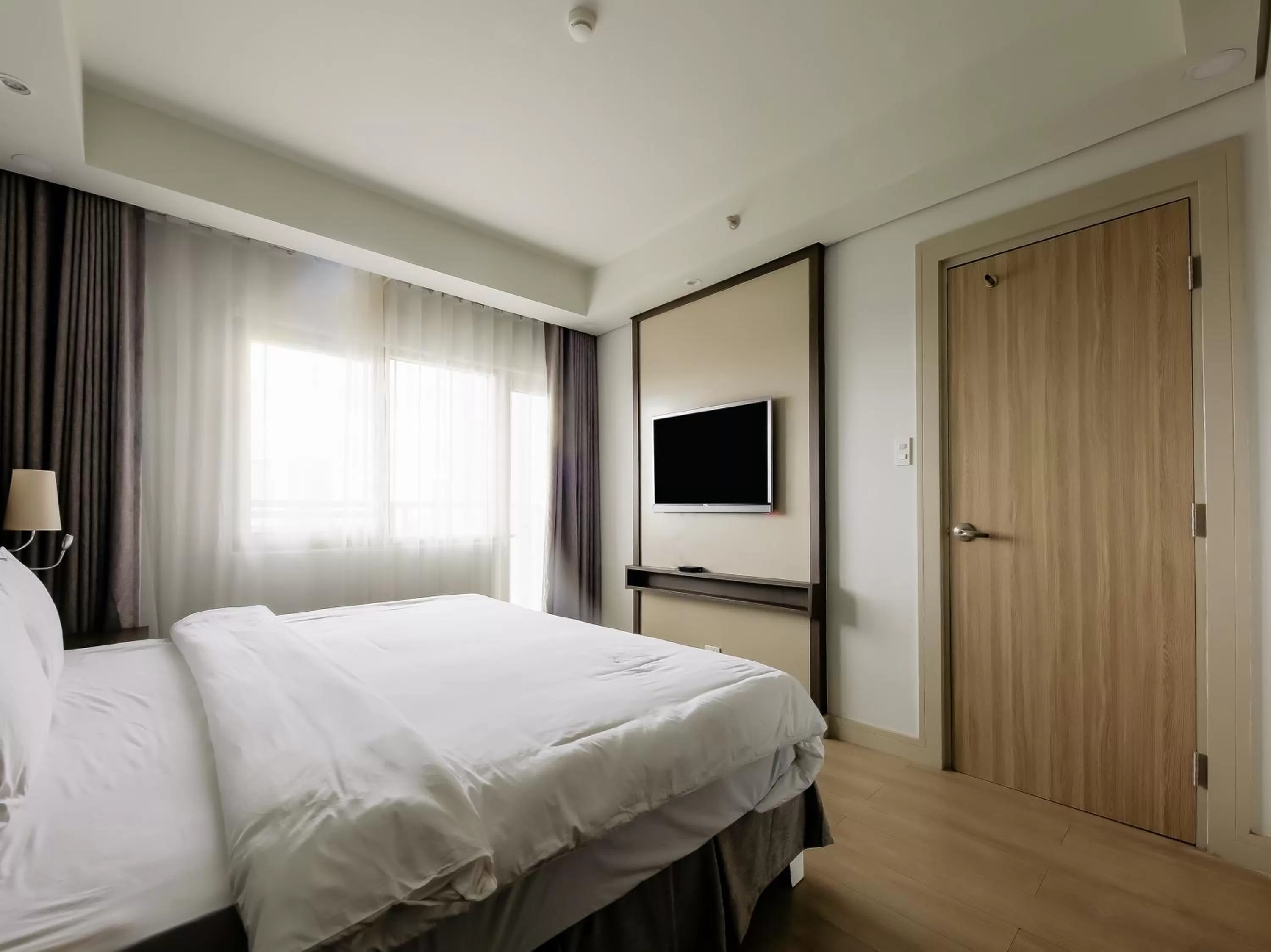 Bedroom, Bed in Capital O 804 The Residences at Bonifacio Civic Center