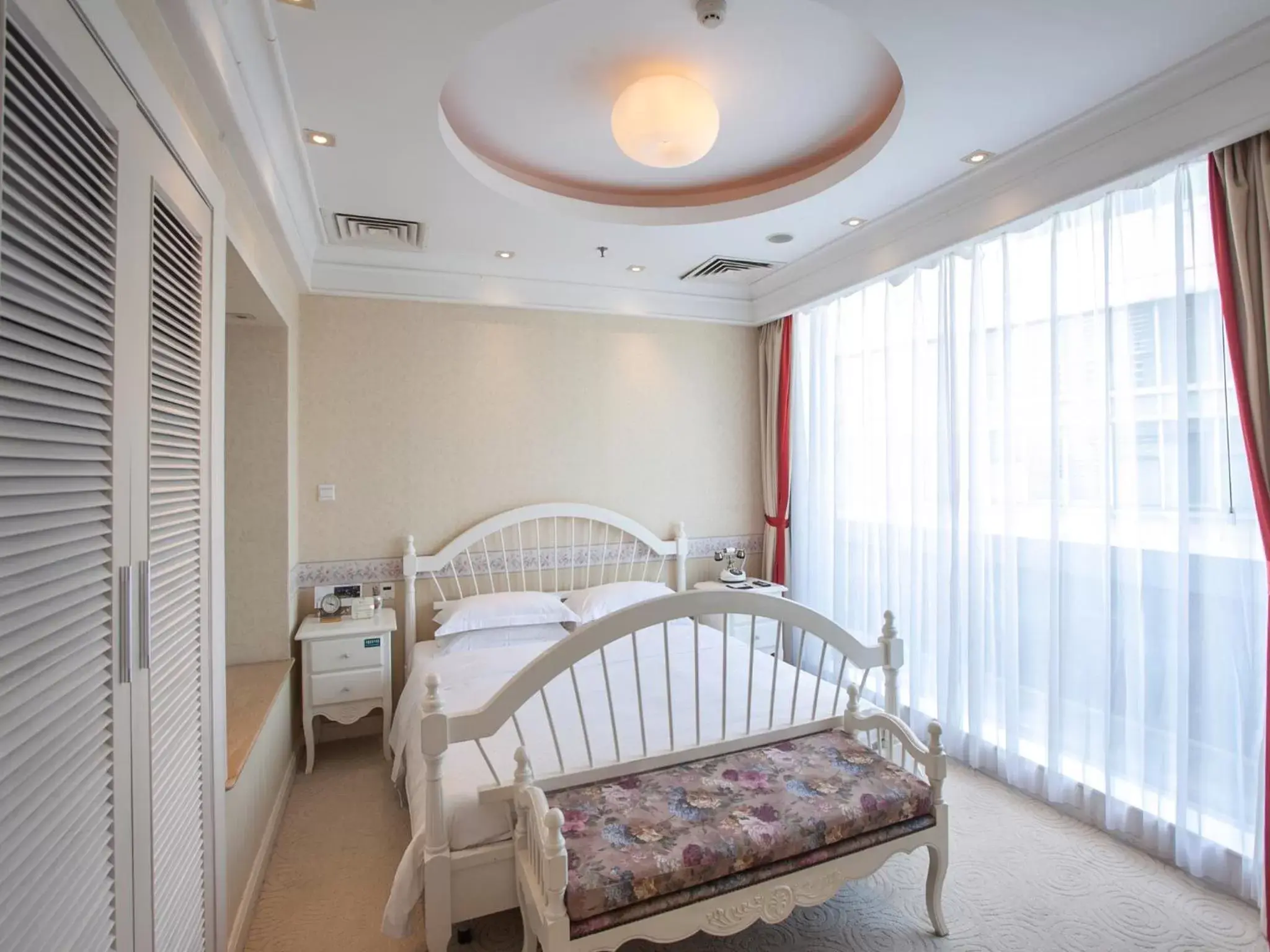 Bed in Hua Shi Hotel Bed in Hua Shi Hotel