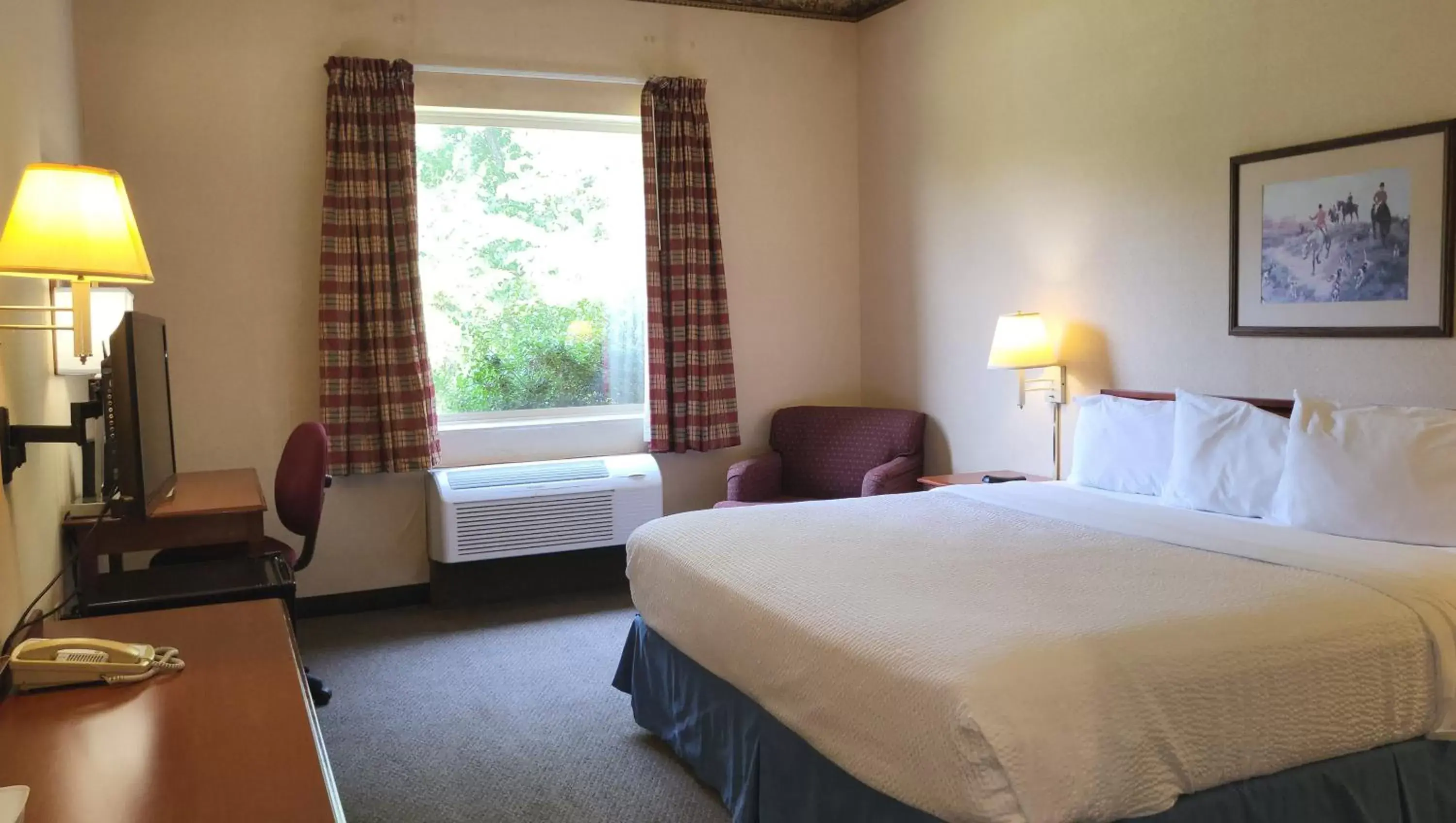 Photo of the whole room, Bed in Magnuson Hotel West Liberty