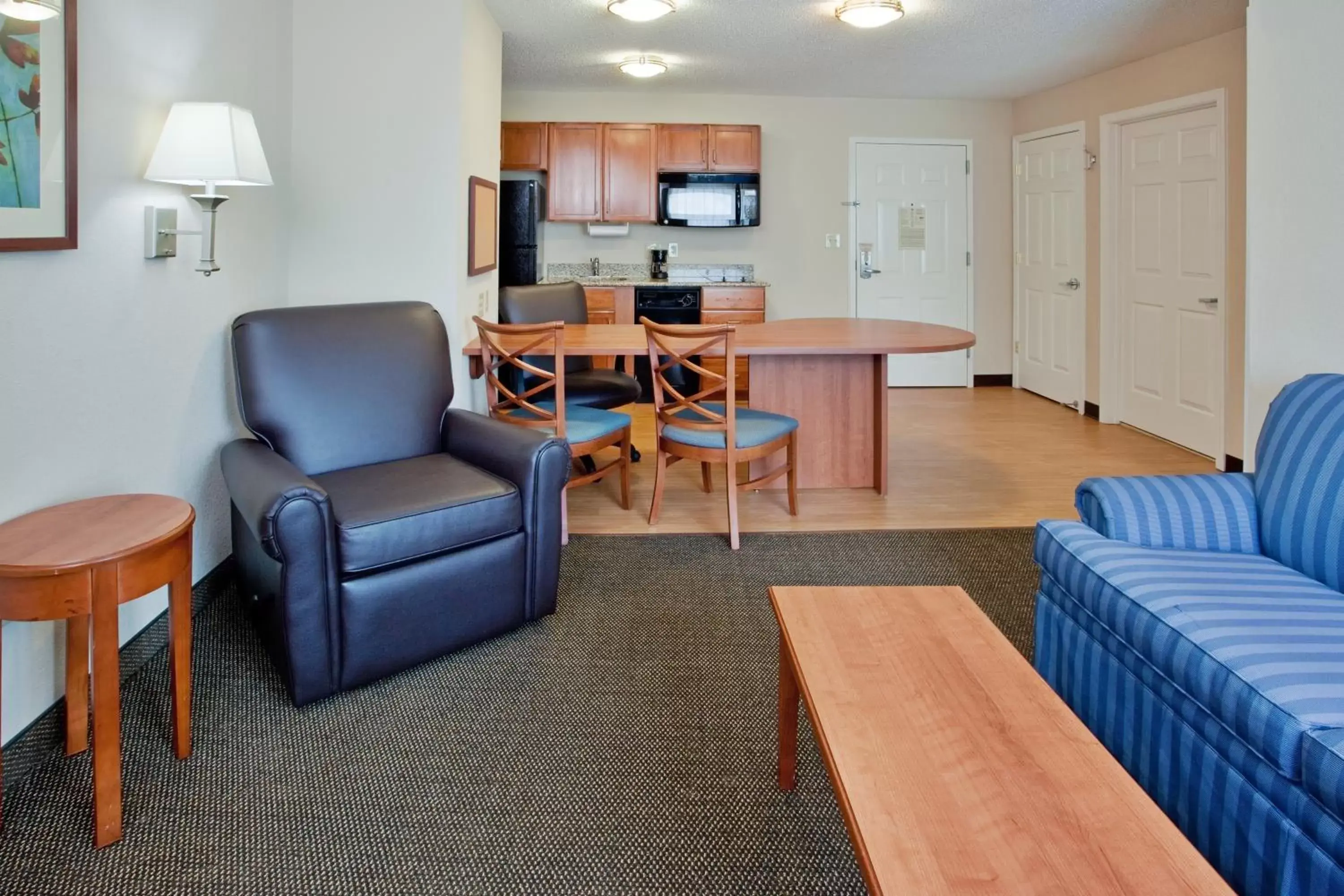 Bedroom, Seating Area in Candlewood Suites Colonial Heights - Fort Lee, an IHG Hotel