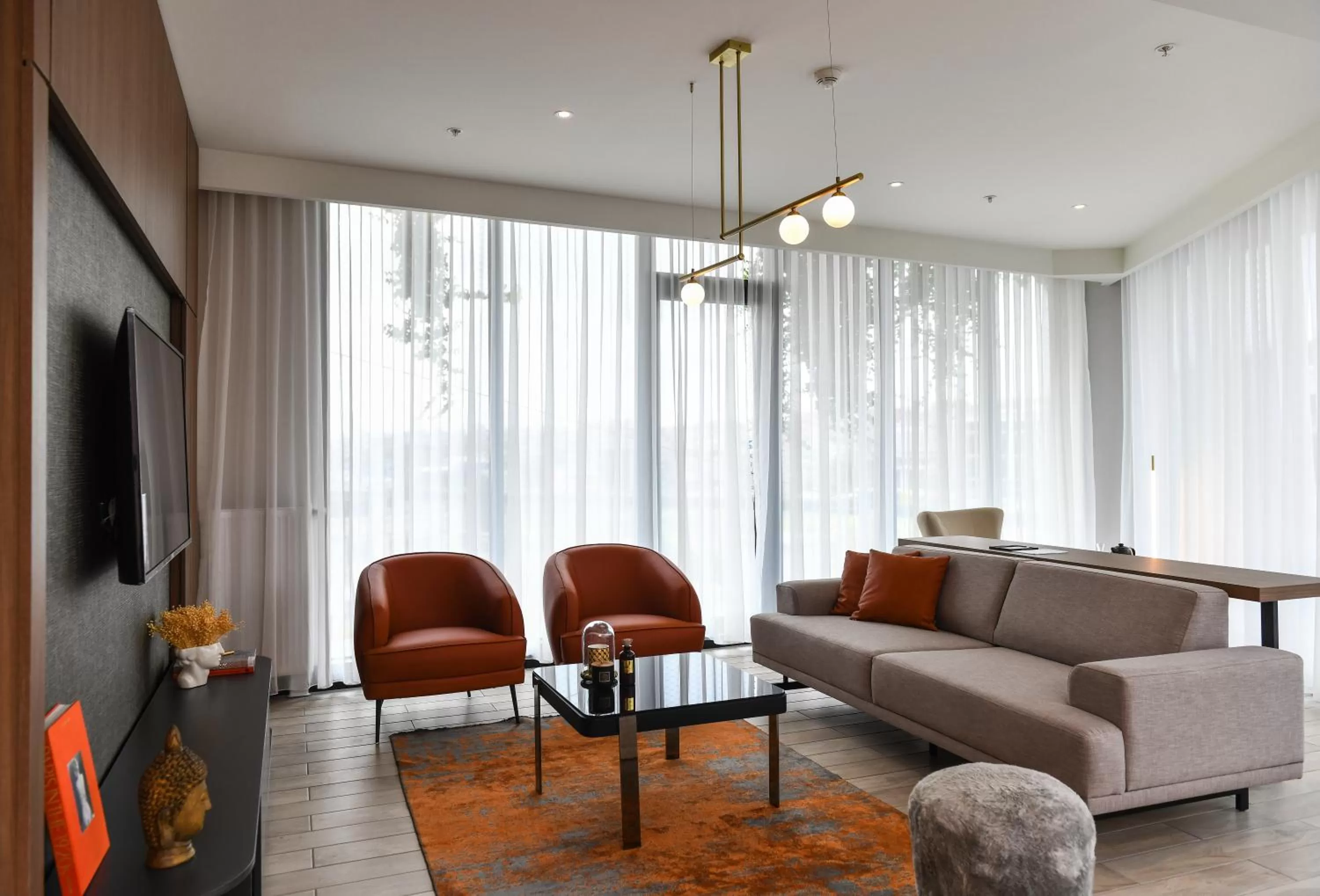 Living room in WestSide Residences by Rotana