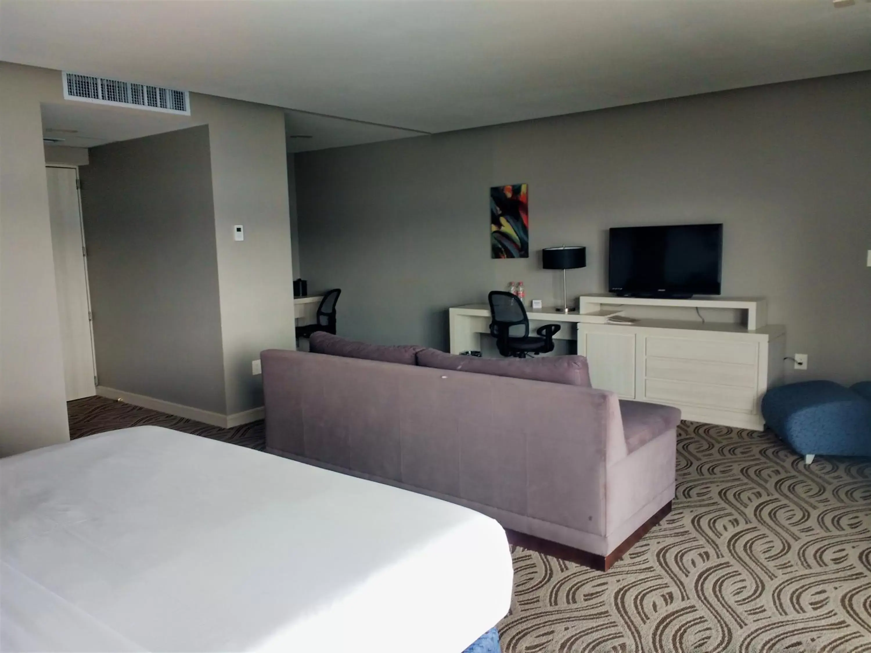 Photo of the whole room, TV/Entertainment Center in Holiday Inn Express Pachuca, an IHG Hotel