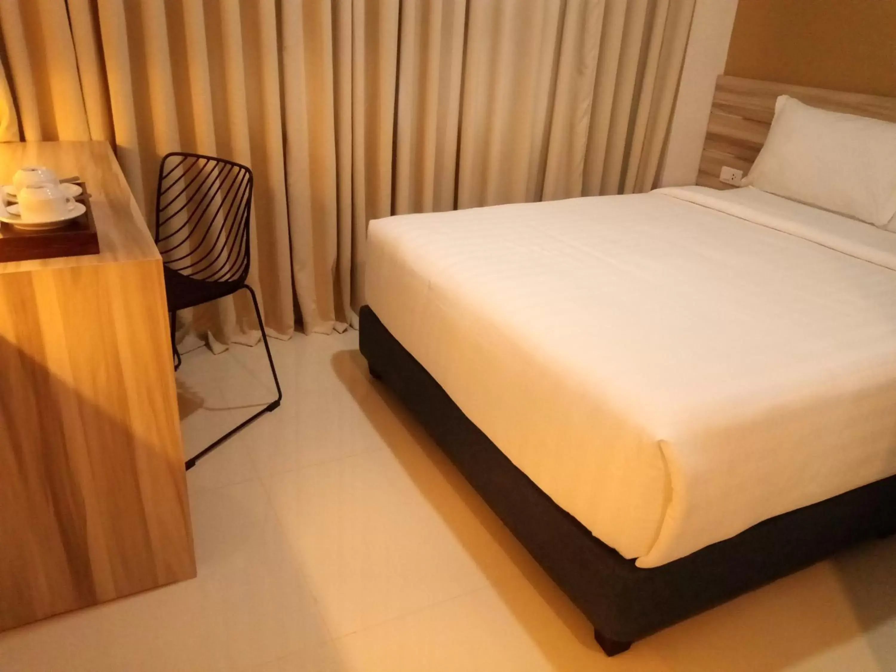 Bed in Figtree Hotel