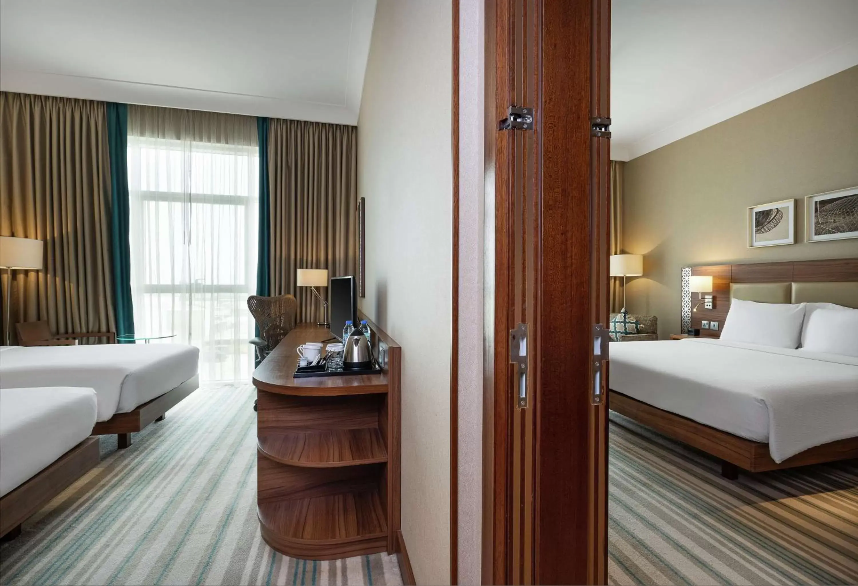Photo of the whole room, Bed in Hilton Garden Inn Dubai Al Muraqabat - Deira
