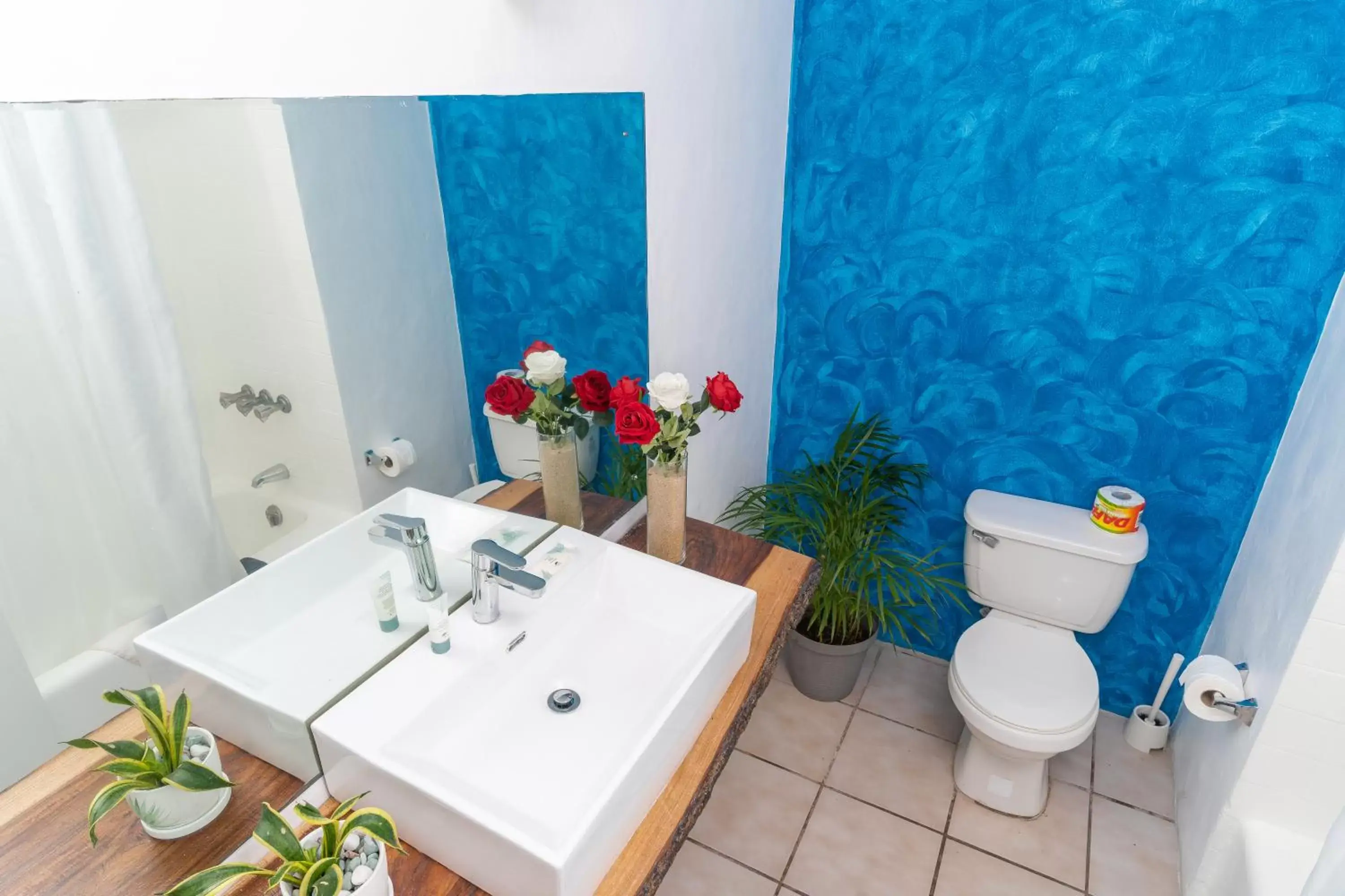 Bathroom in Sand and Tan Beach Hotel