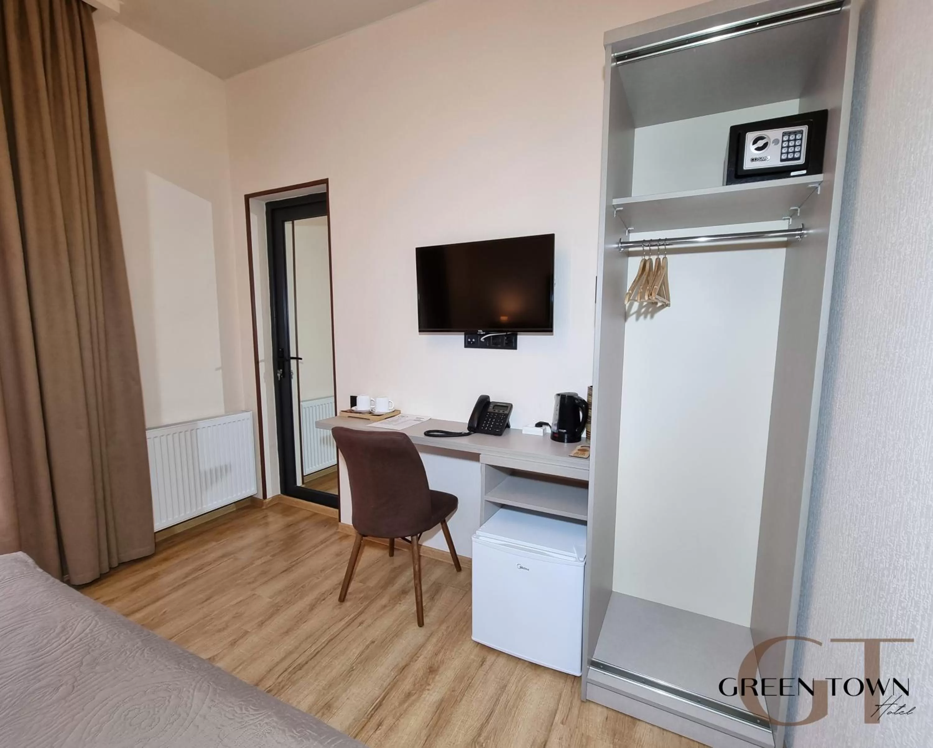 TV and multimedia in Hotel Green Town