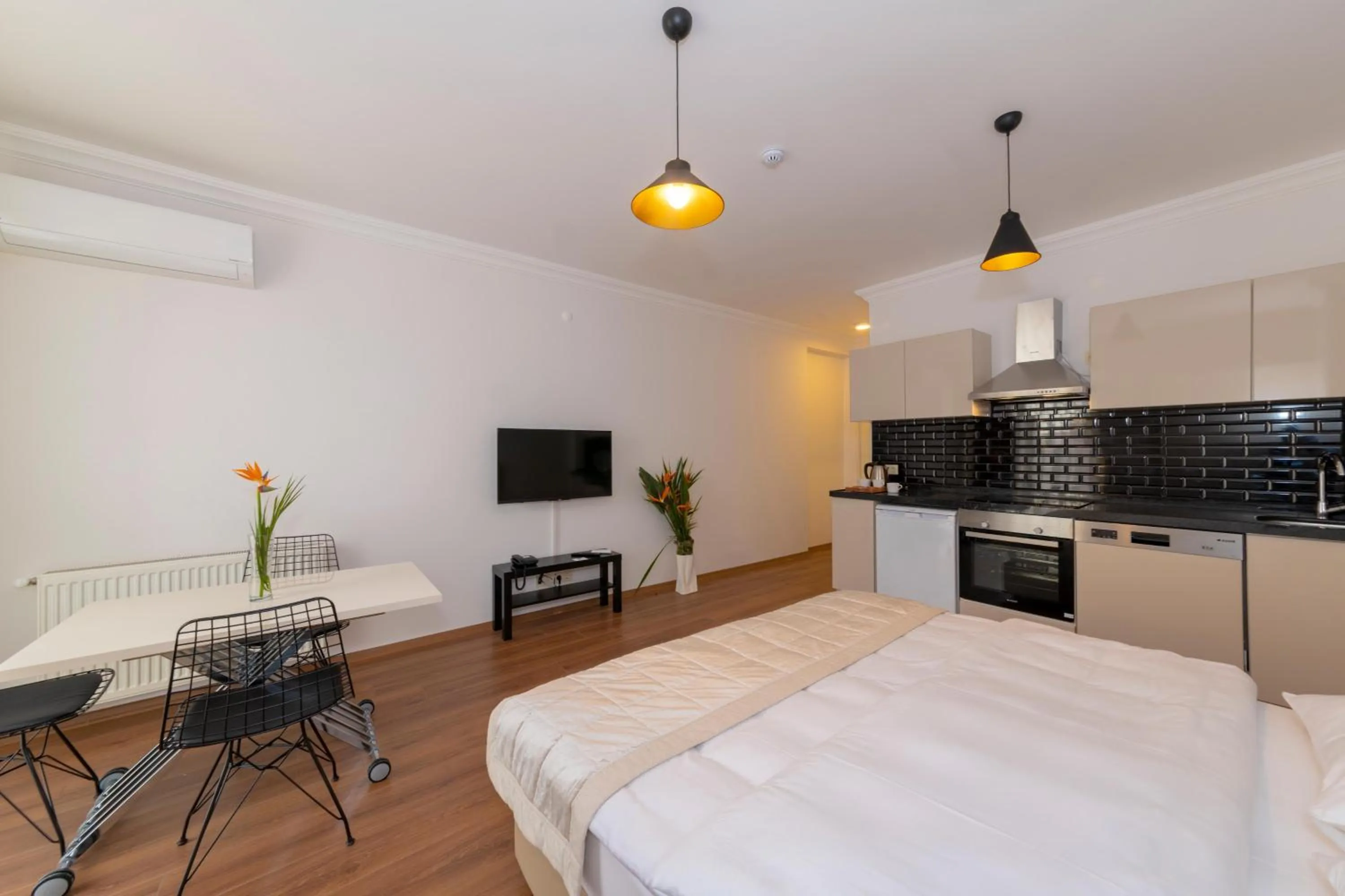 Photo of the whole room, Bed in Joy Suites