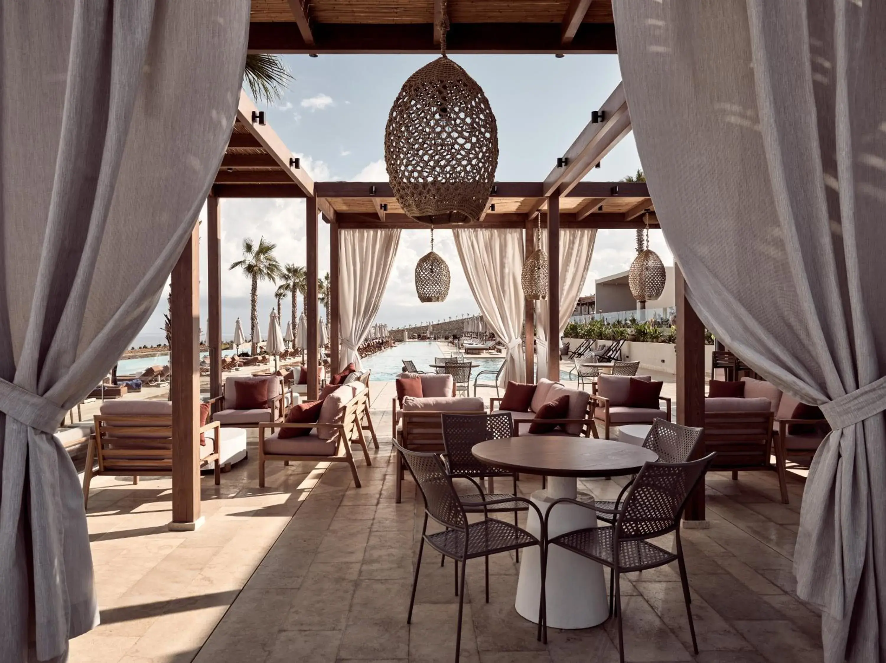 Lounge or bar, Restaurant/Places to Eat in The Royal Senses Resort Crete, Curio Collection by Hilton