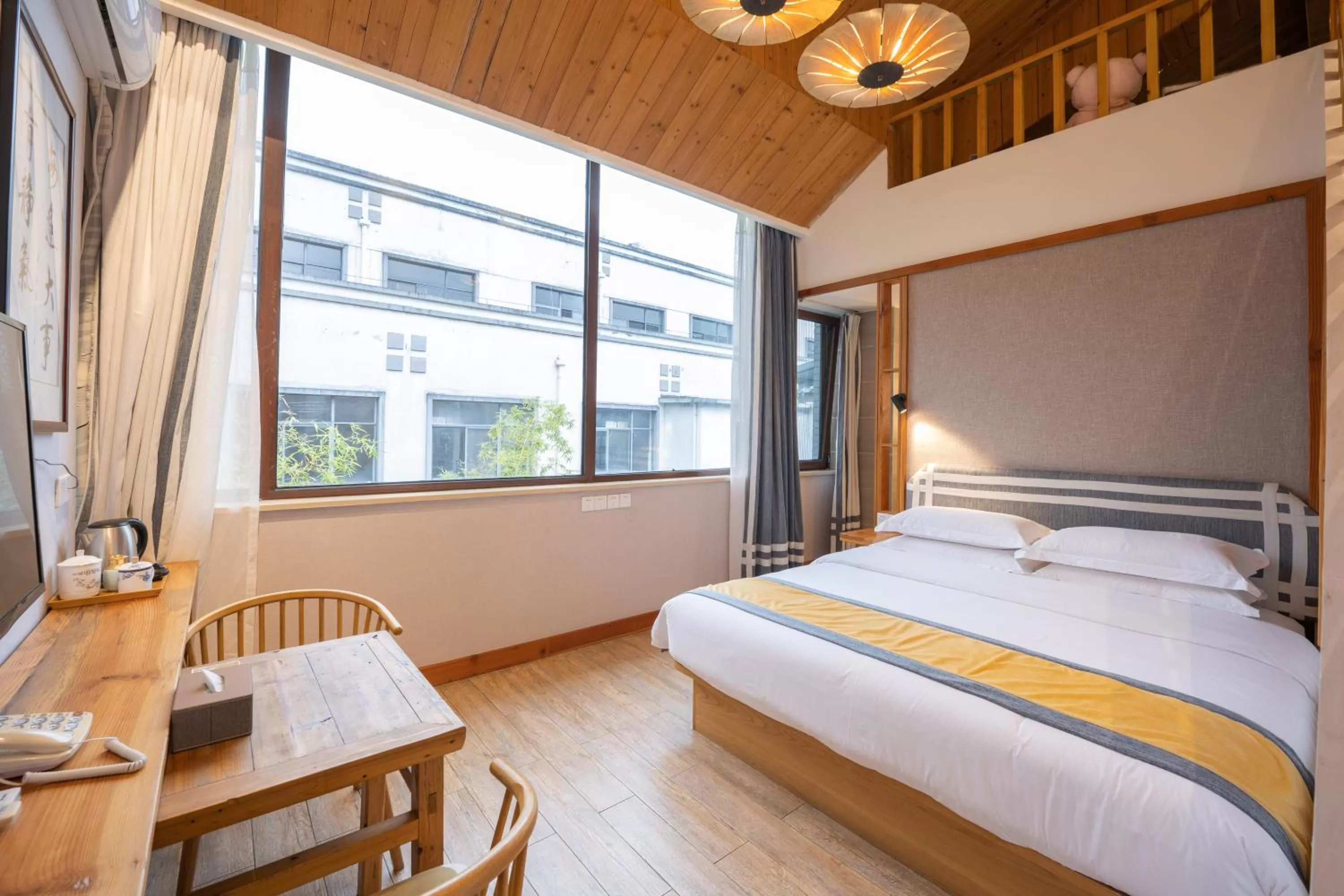 Bed in Mild Spring Boutique Hotel