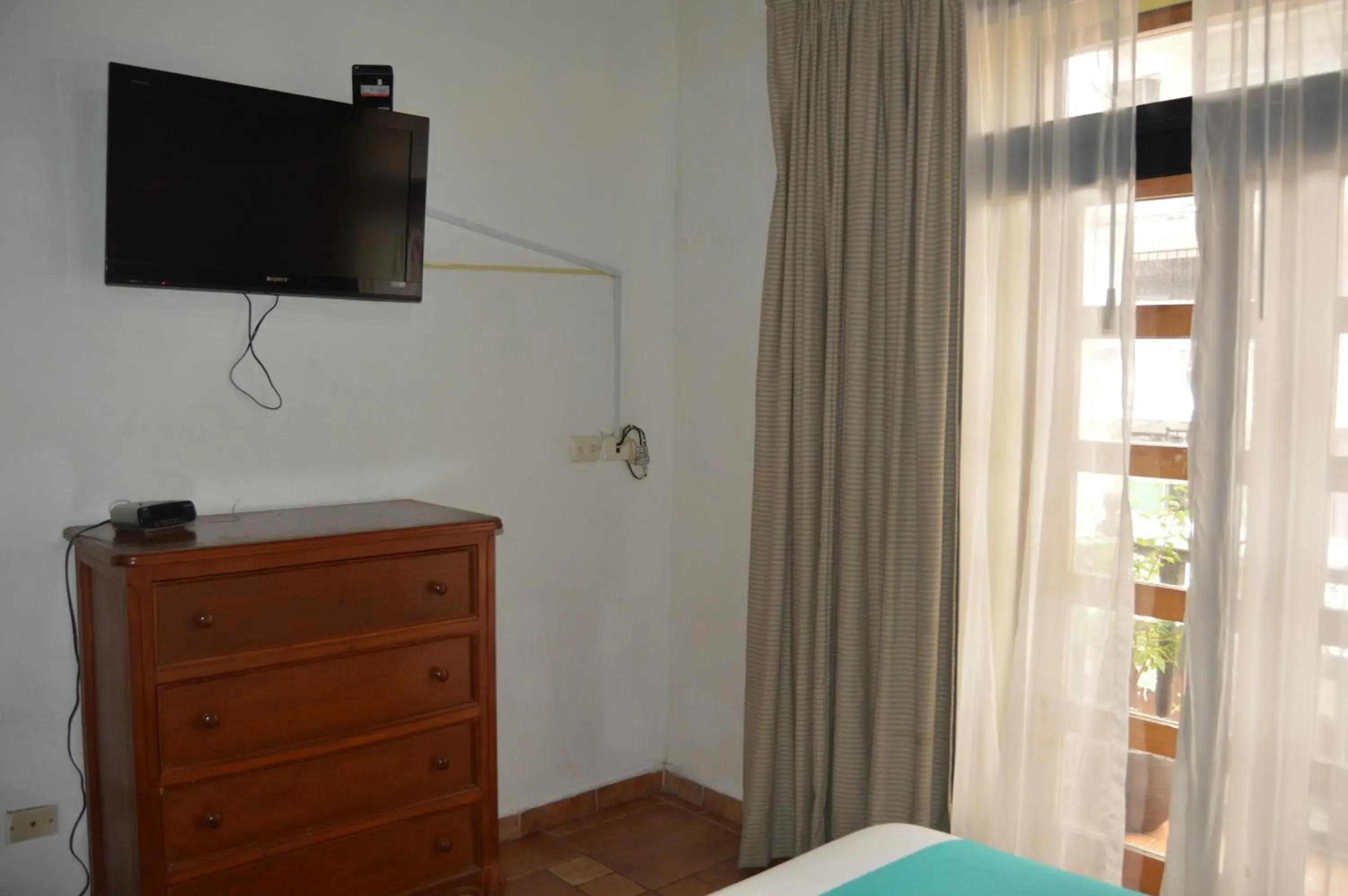 TV and multimedia, TV/Entertainment Center in Hotel Meson del Mar