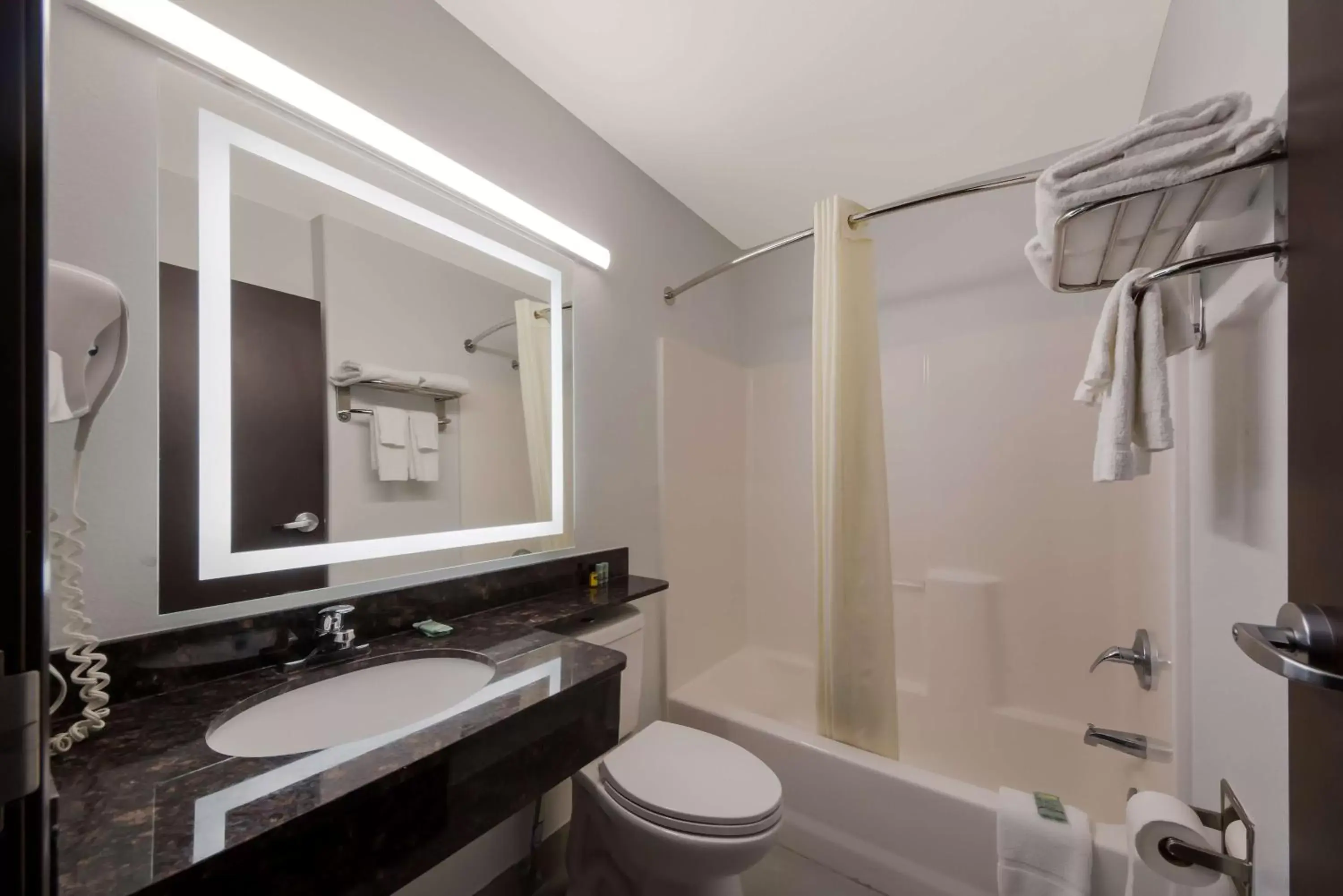 Bathroom in SureStay Hotel by Best Western San Antonio West SeaWorld