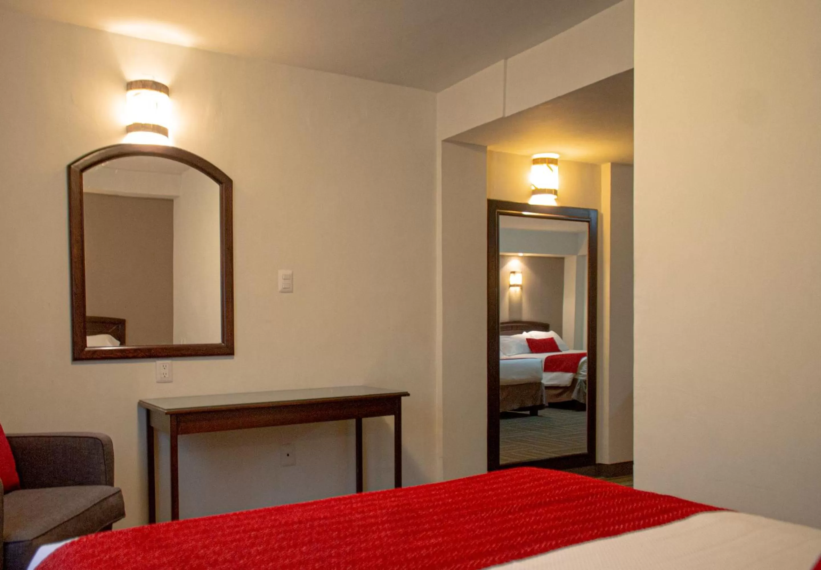 Bedroom, Bed in Ramada Plaza by Wyndham Leon