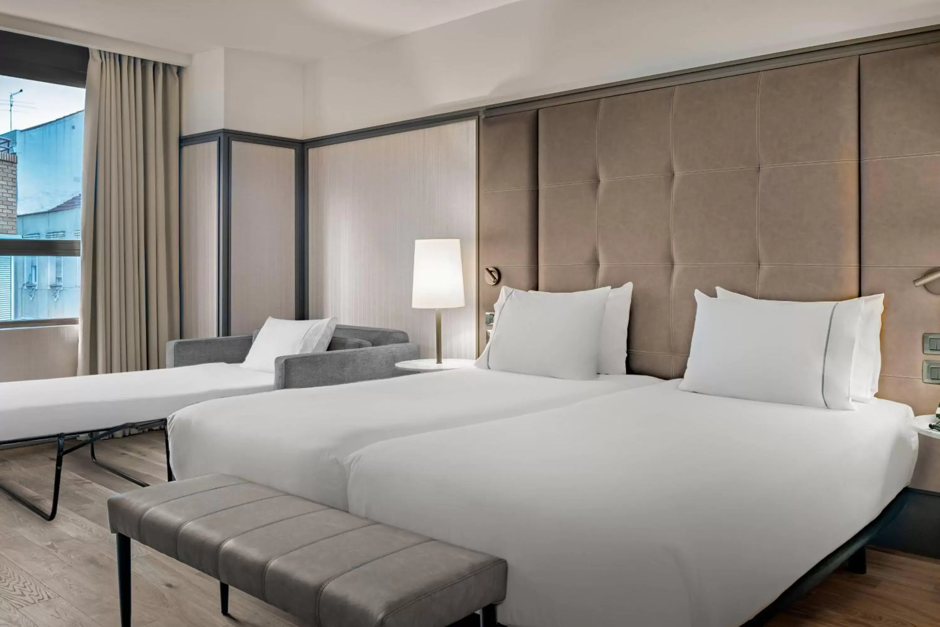 Photo of the whole room, Bed in AC Hotel Avenida de América by Marriott