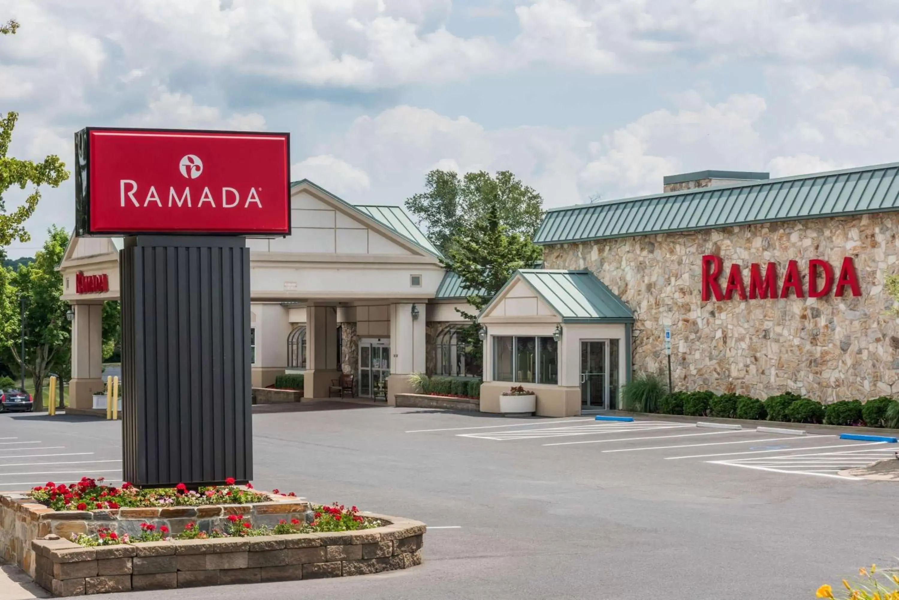 Property building in Ramada by Wyndham State College Hotel & Conference Center