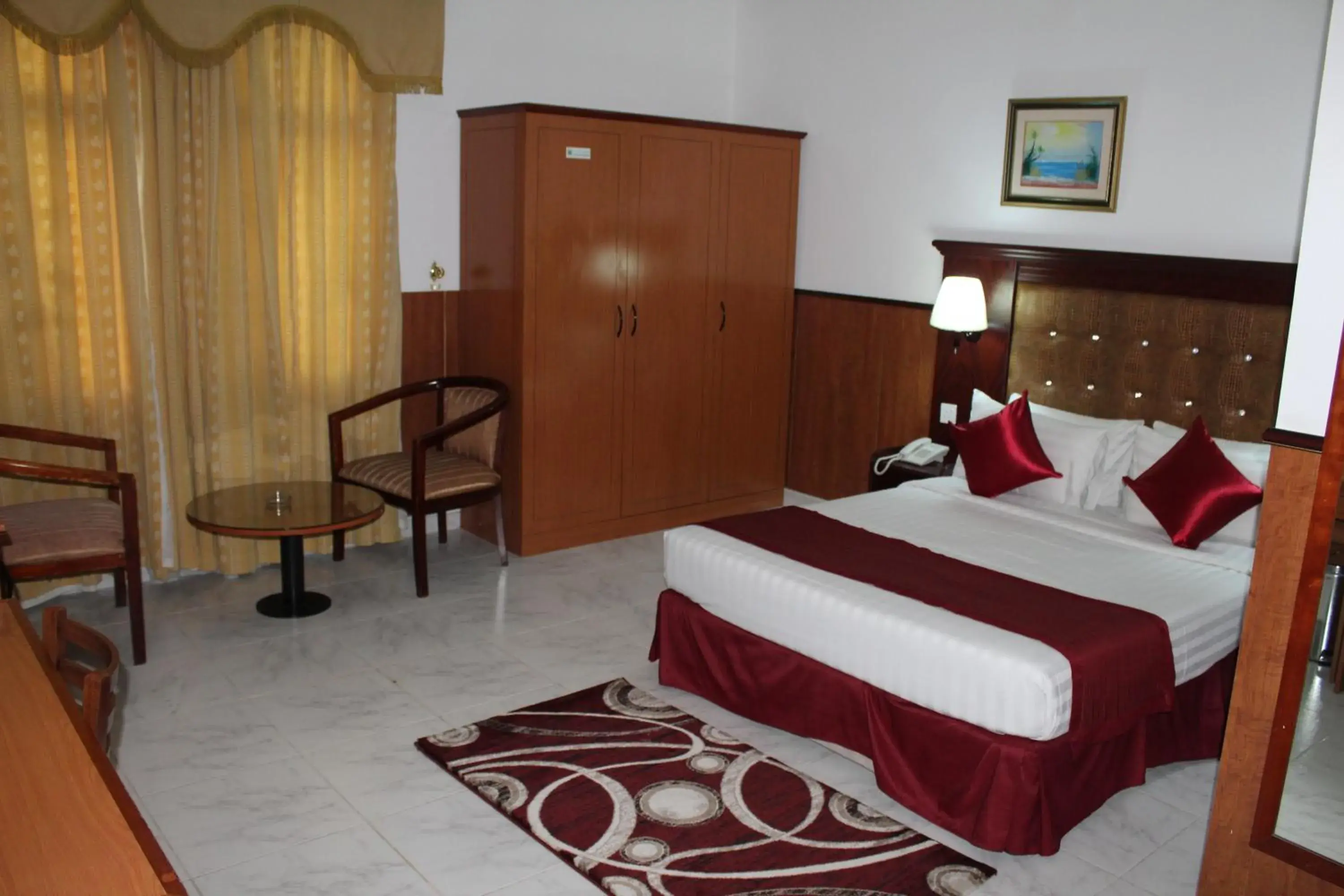 Bed in Grand Nova Hotel