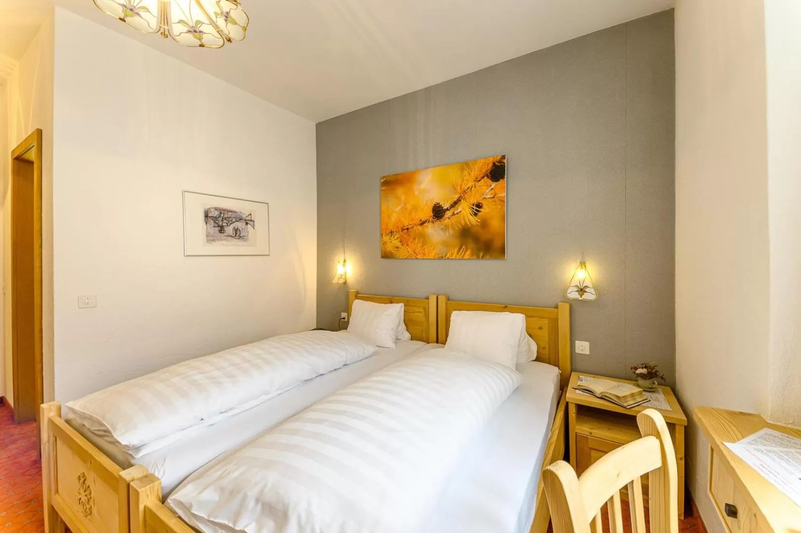 Bedroom, Bed in Hotel Centrale, Typically Swiss