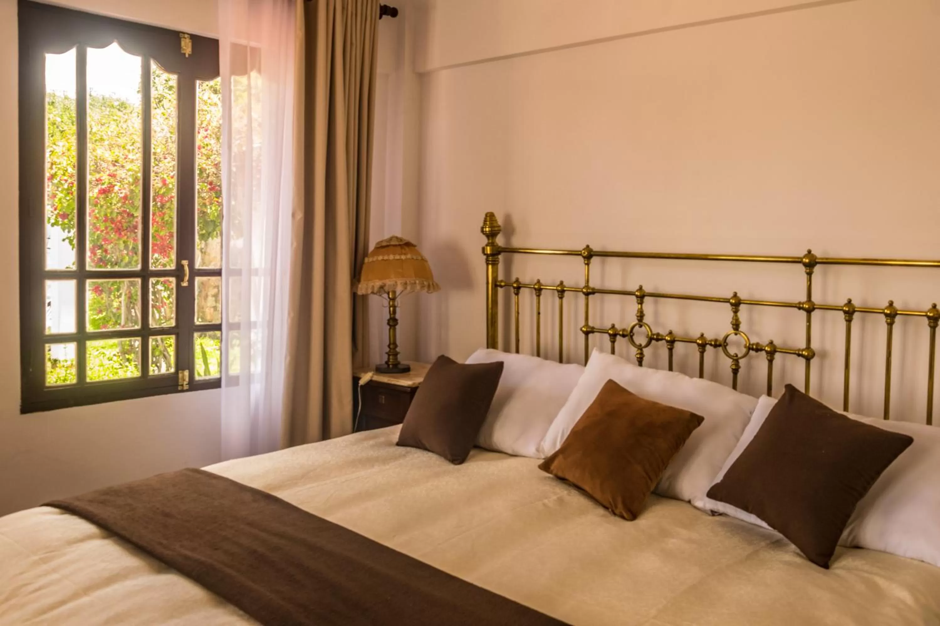 Bed in El Jardin De Su Merced B&B