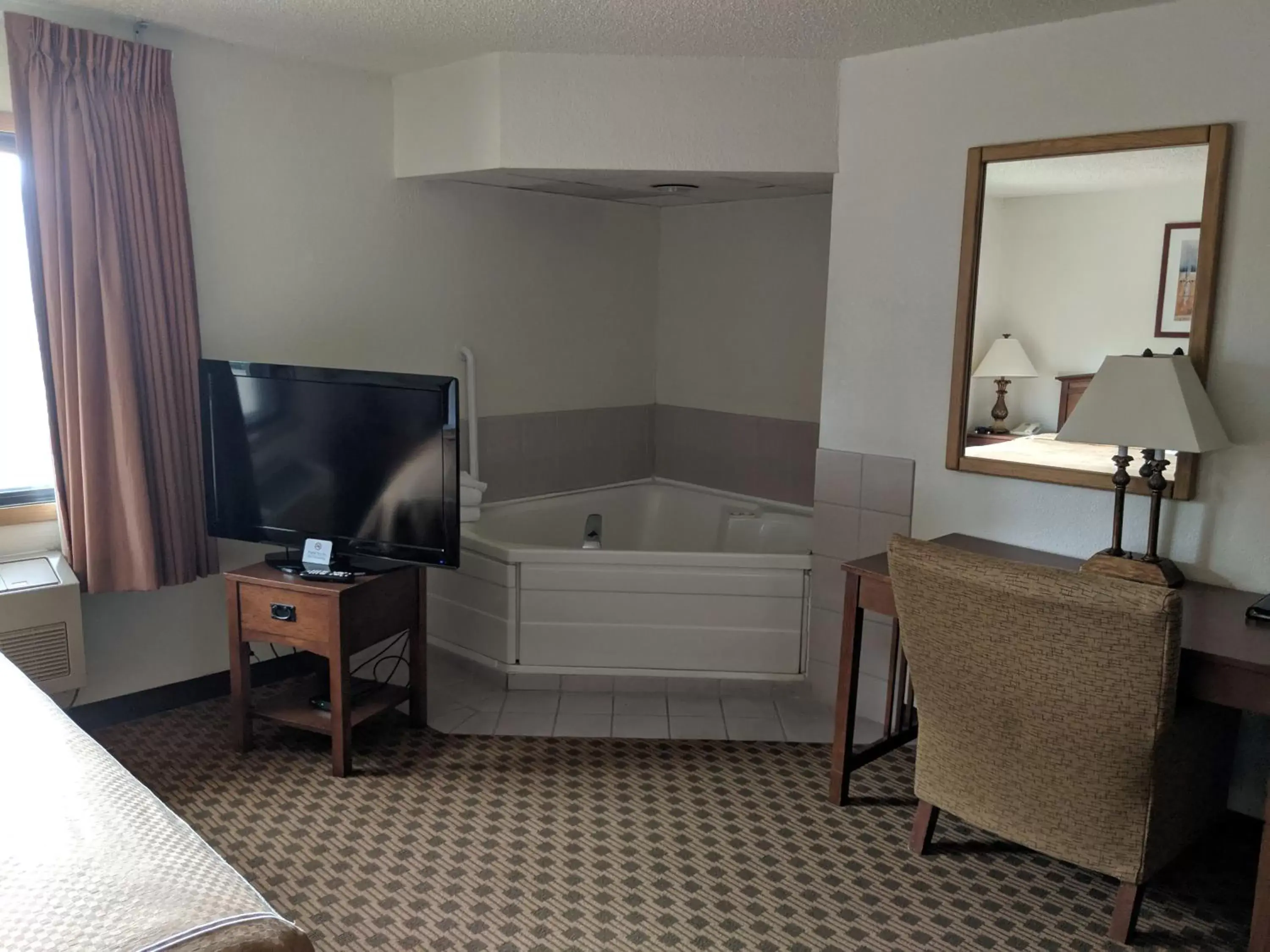 TV and multimedia, Bed in Boarders Inn and Suites by Cobblestone Hotels - Ripon TV and multimedia, Bed in Boarders Inn and Suites by Cobblestone Hotels - Ripon