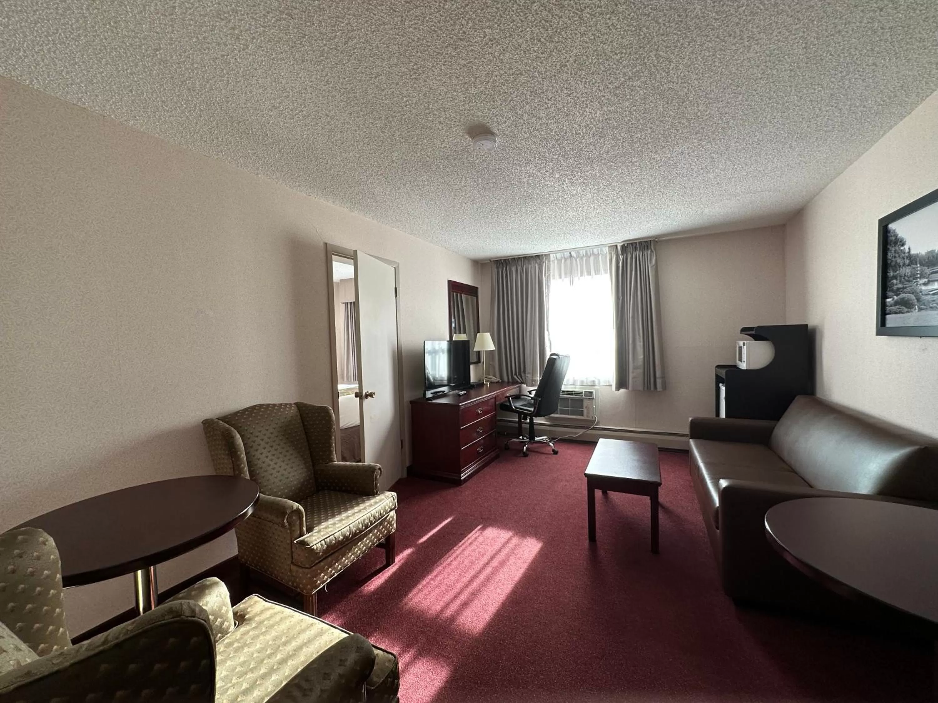 Living room in Super 8 by Wyndham Lethbridge