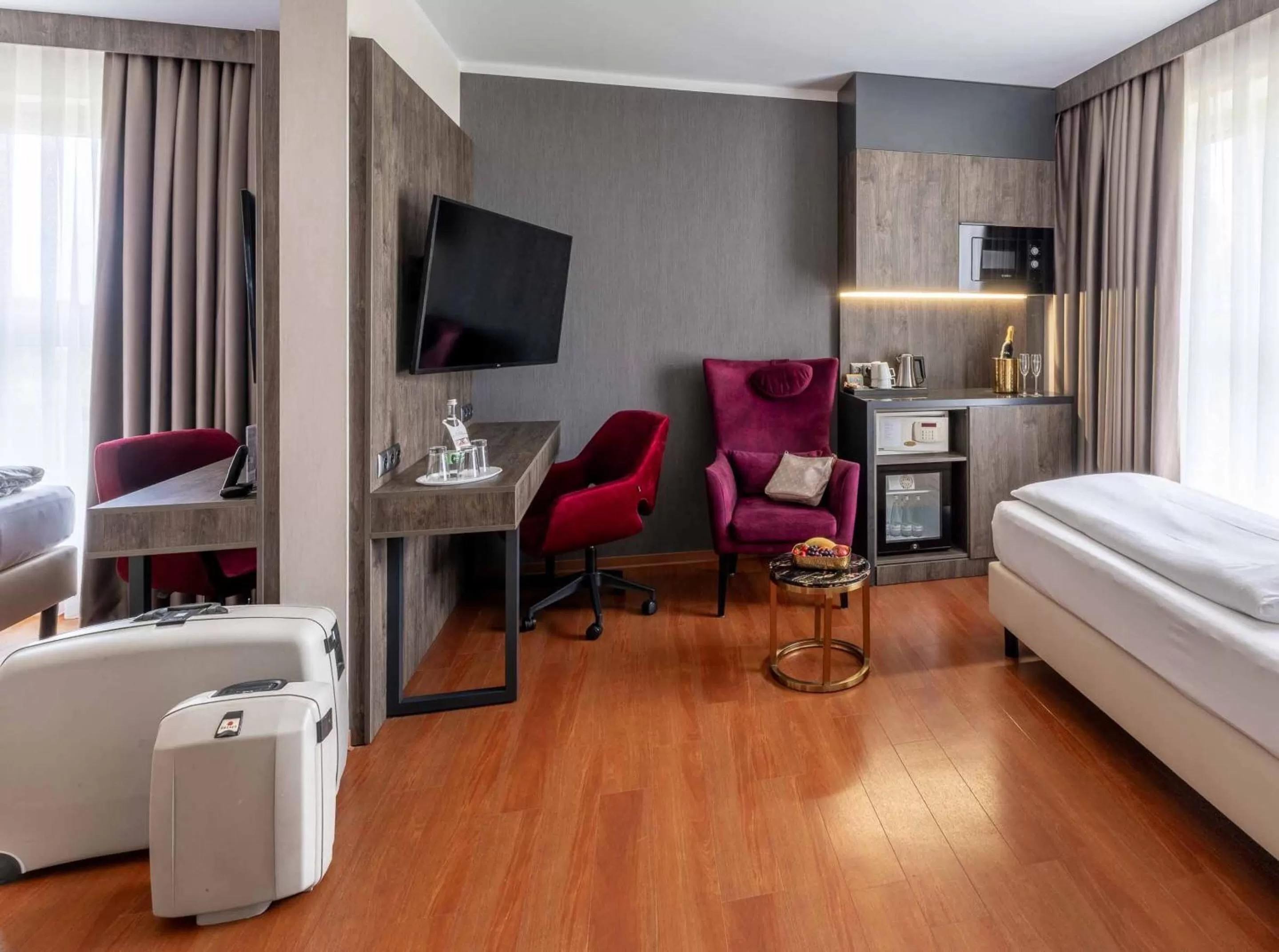 Photo of the whole room, Bed in PLAZA Premium Karlsruhe