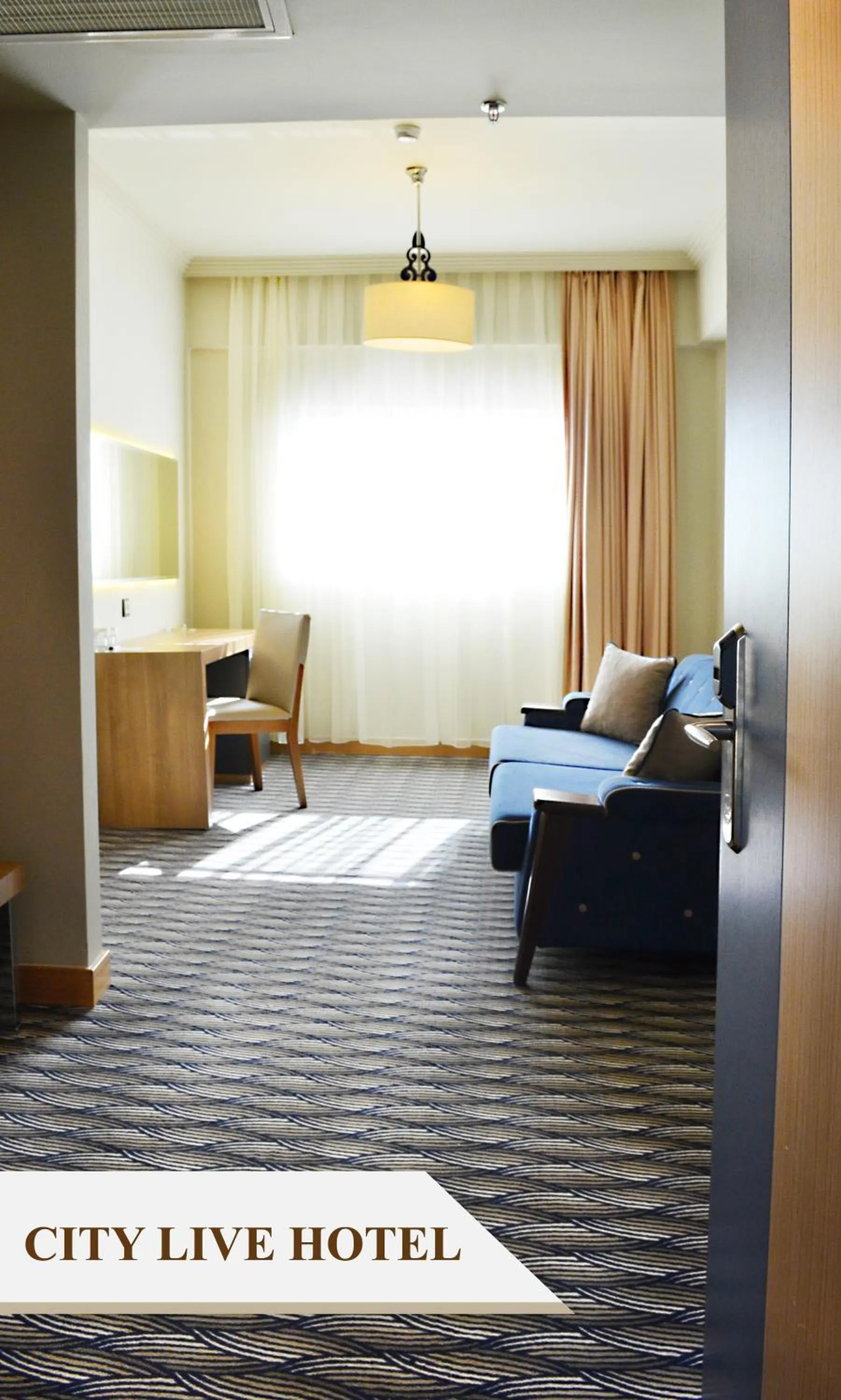 Photo of the whole room, Bed in City Live Hotel