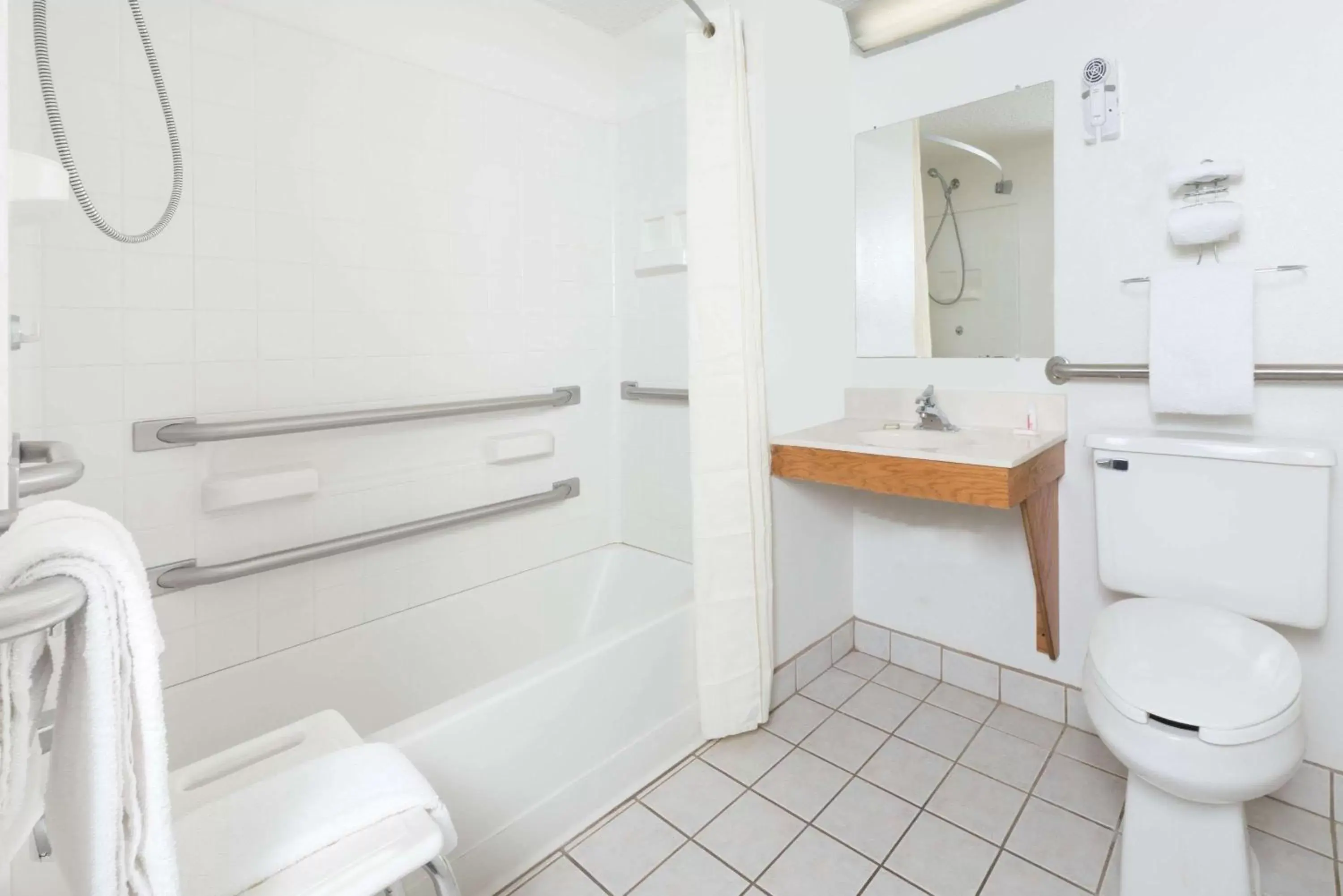 Bathroom in Super 8 by Wyndham Front Royal Bathroom in Super 8 by Wyndham Front Royal