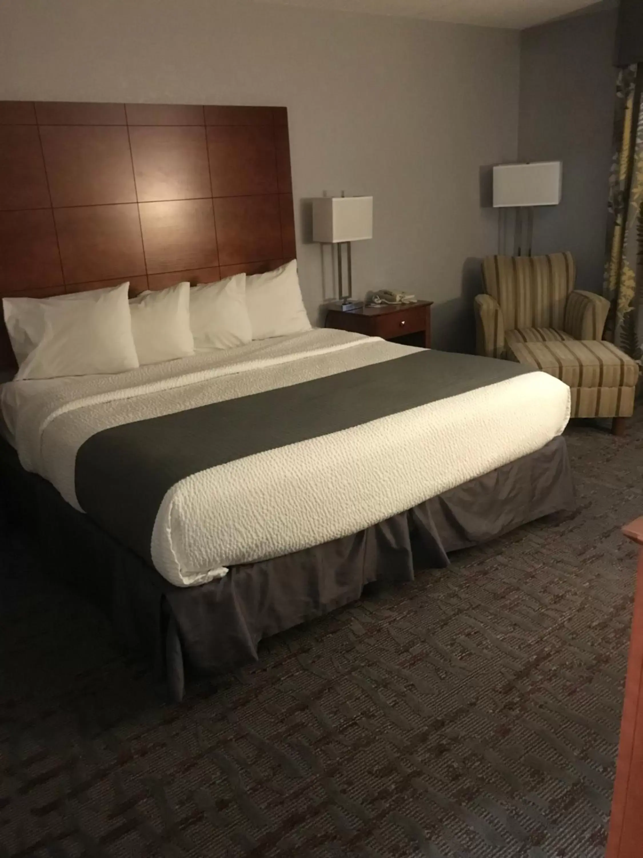 Bed in AmericInn by Wyndham Ankeny/Des Moines
