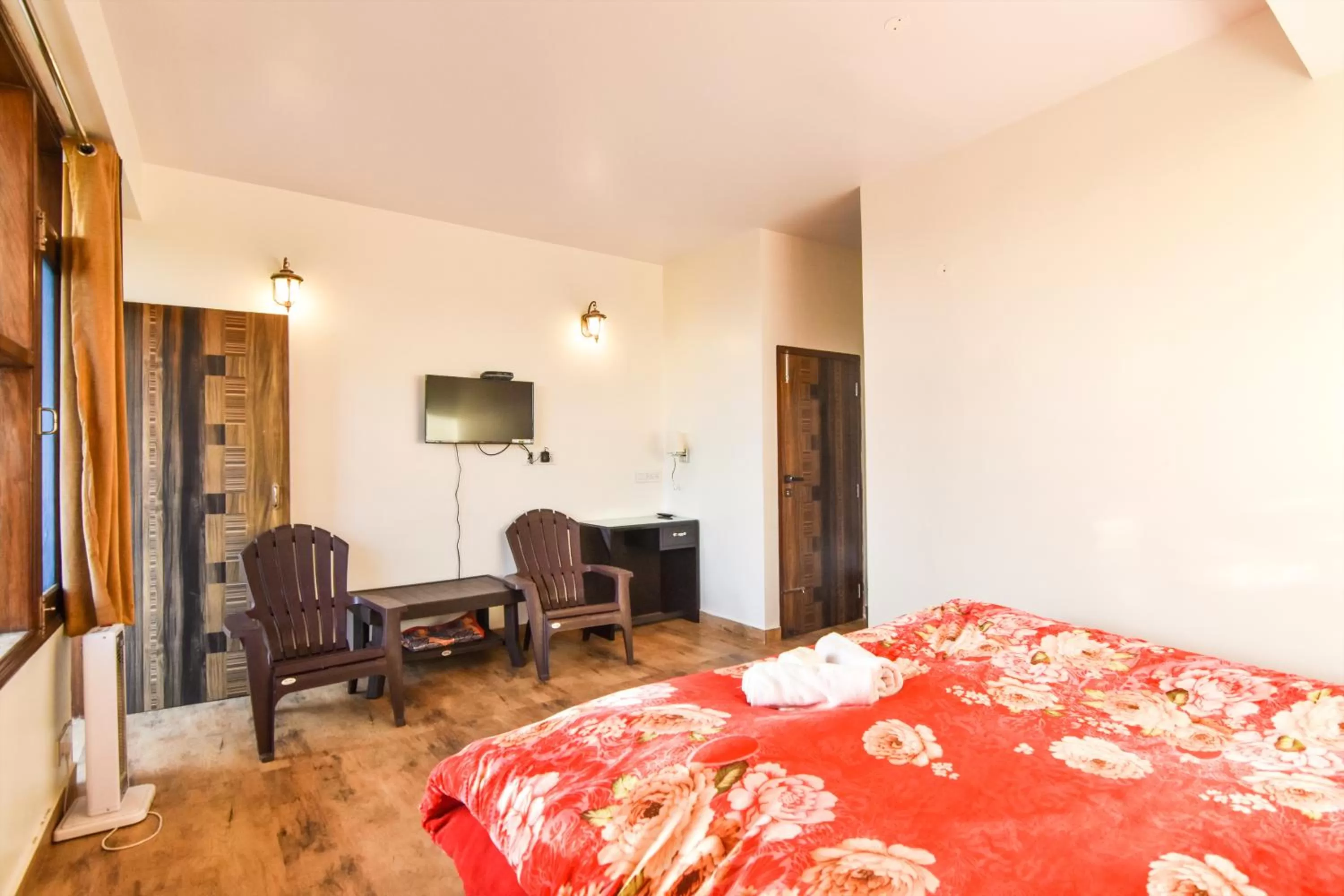 Bedroom in Dhanlaxmi Apartments