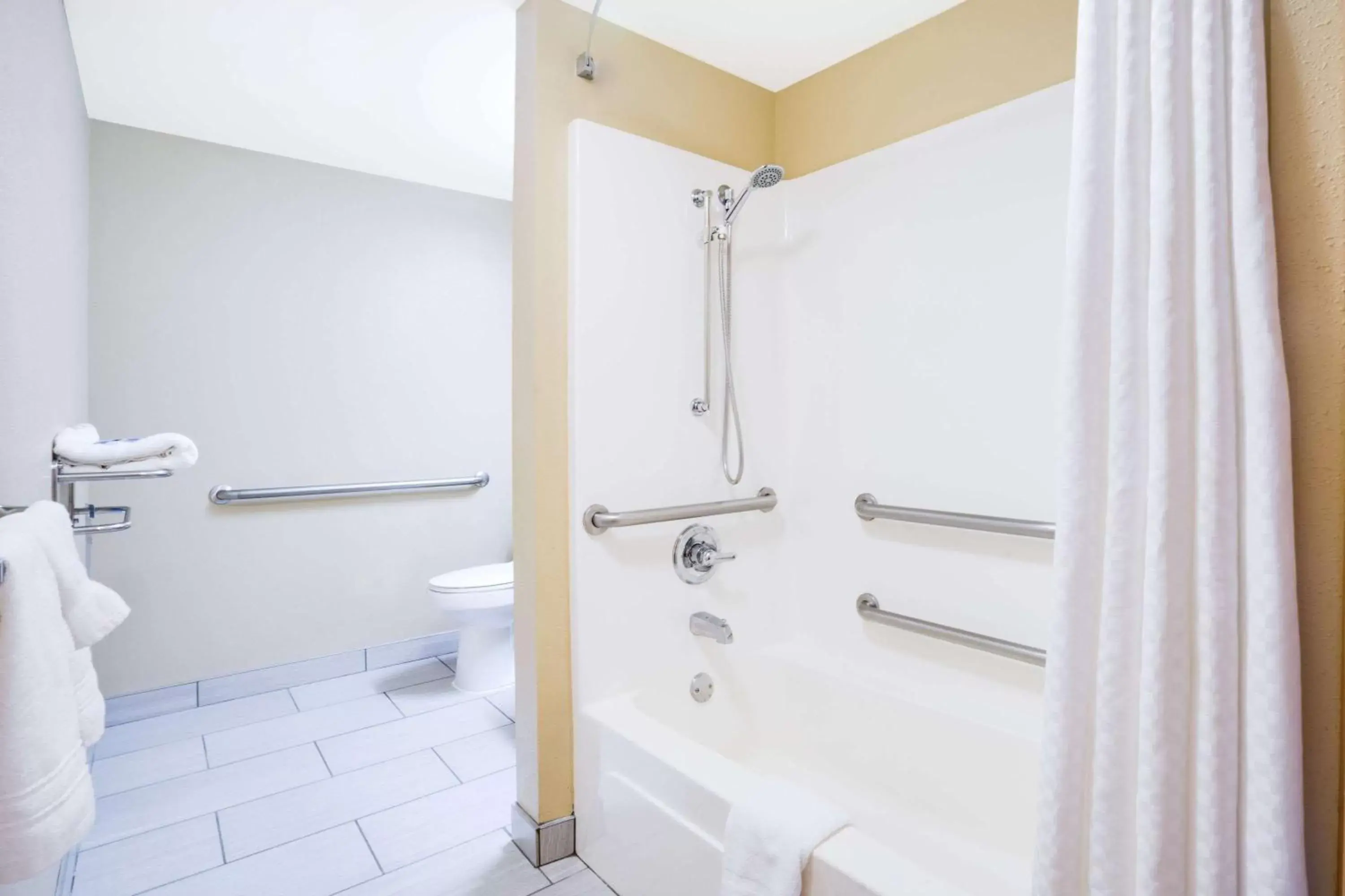 Bathroom in Microtel Inn & Suites by Wyndham Pigeon Forge
