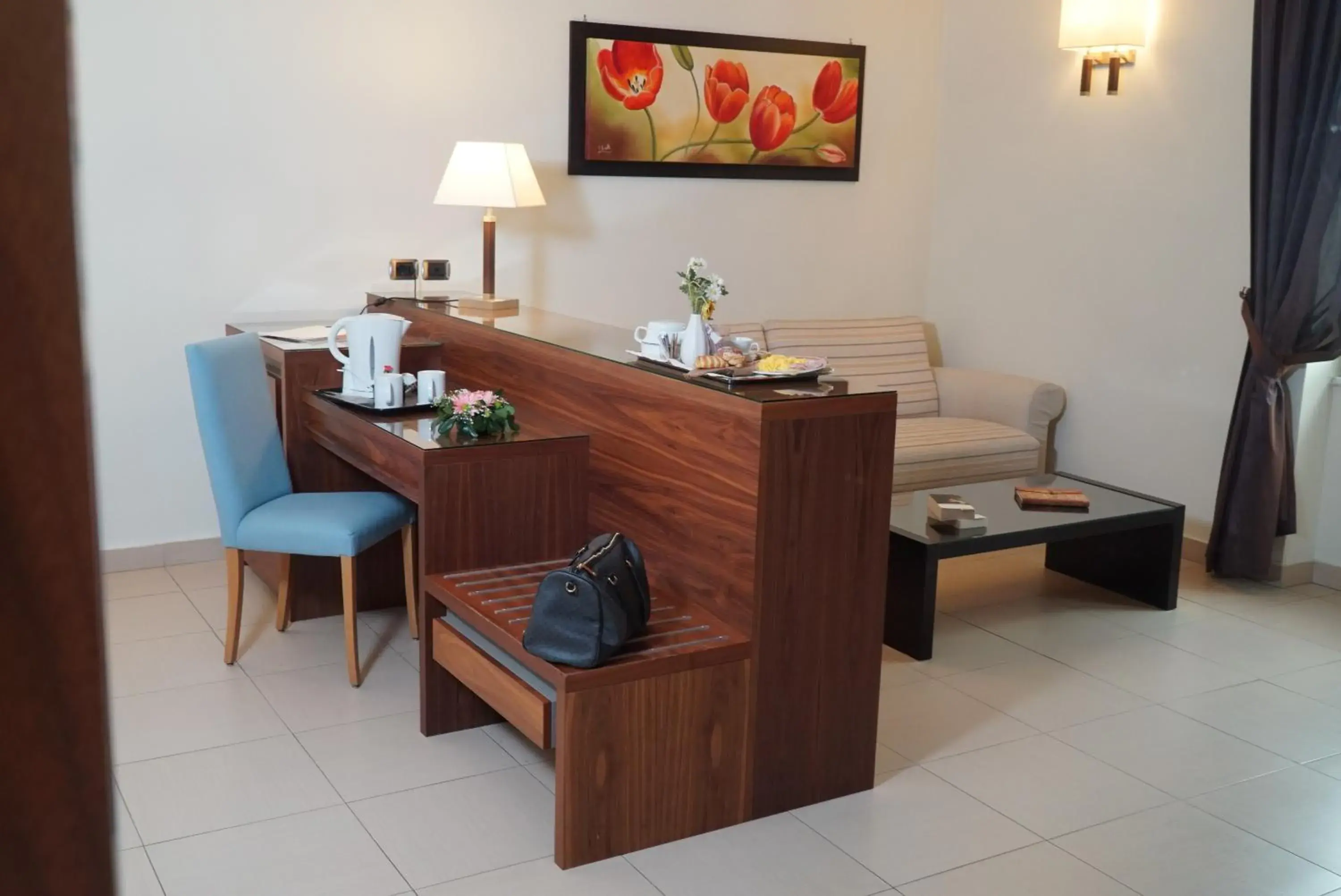 Seating area in Suites & Residence Hotel