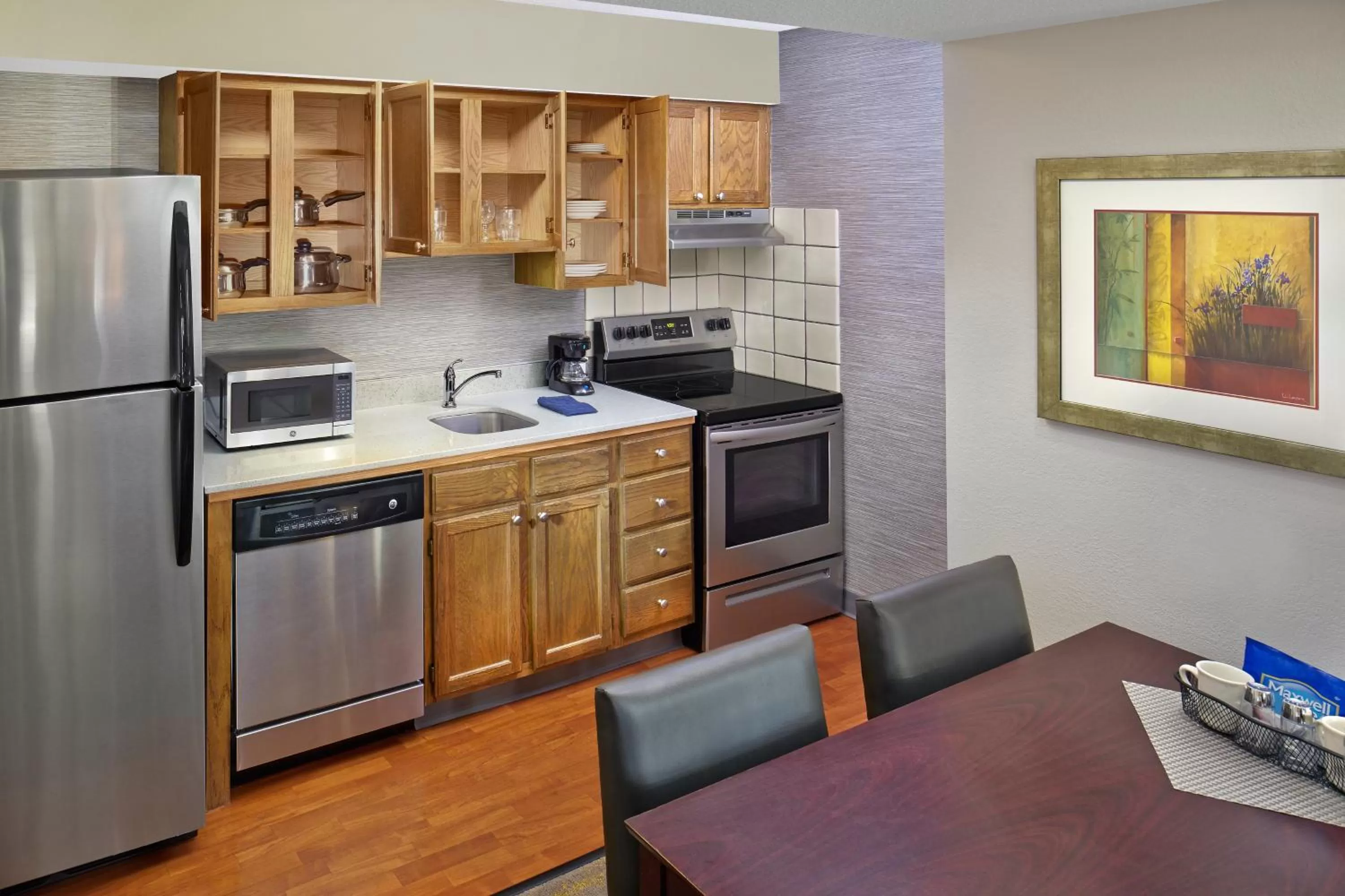 Kitchen or kitchenette in New Haven Village Suites