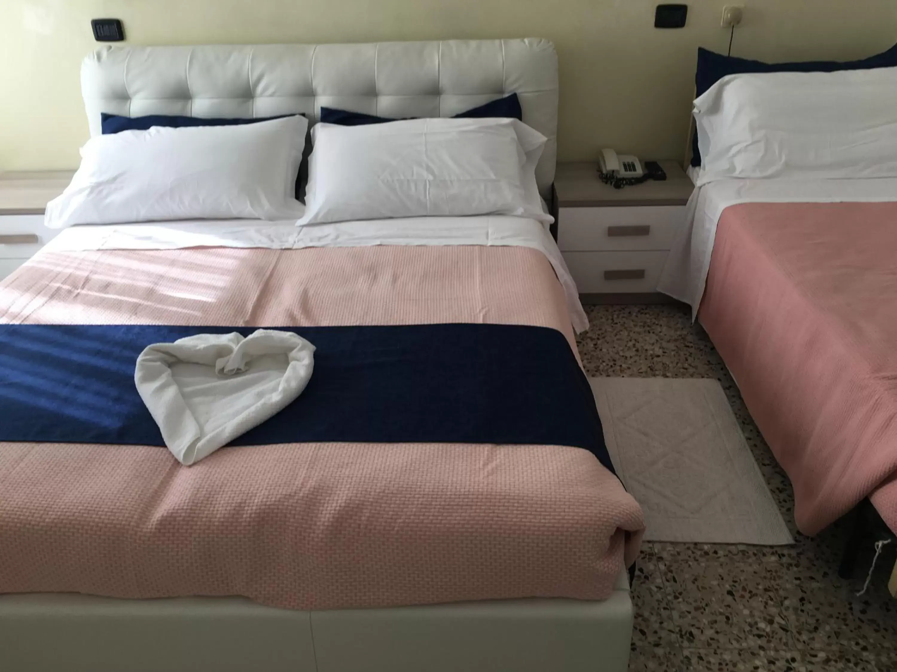 Bed in Dea Della Salute Hotel