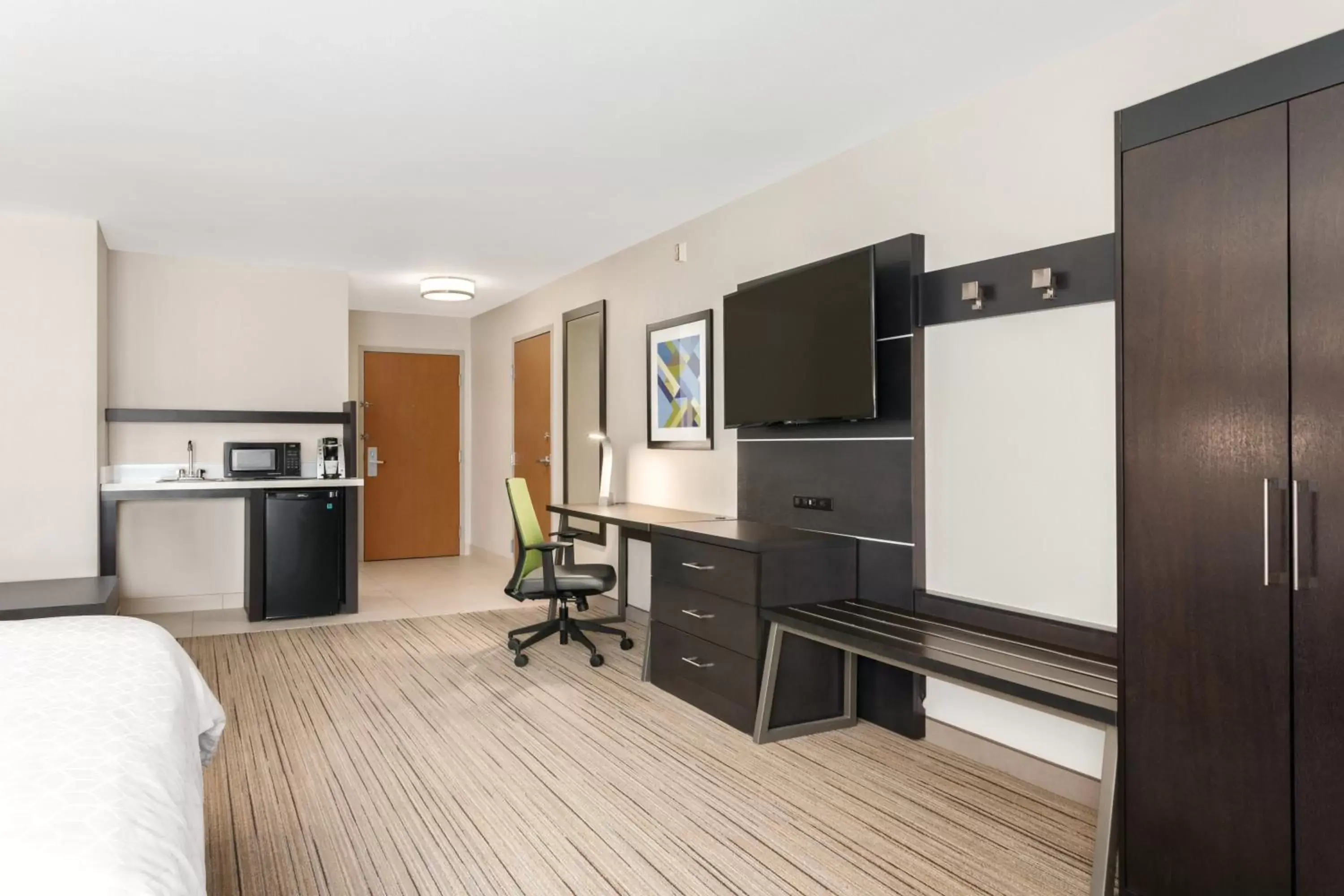 Photo of the whole room, TV/Entertainment Center in Holiday Inn Express Hotel & Suites Lawton-Fort Sill, an IHG Hotel