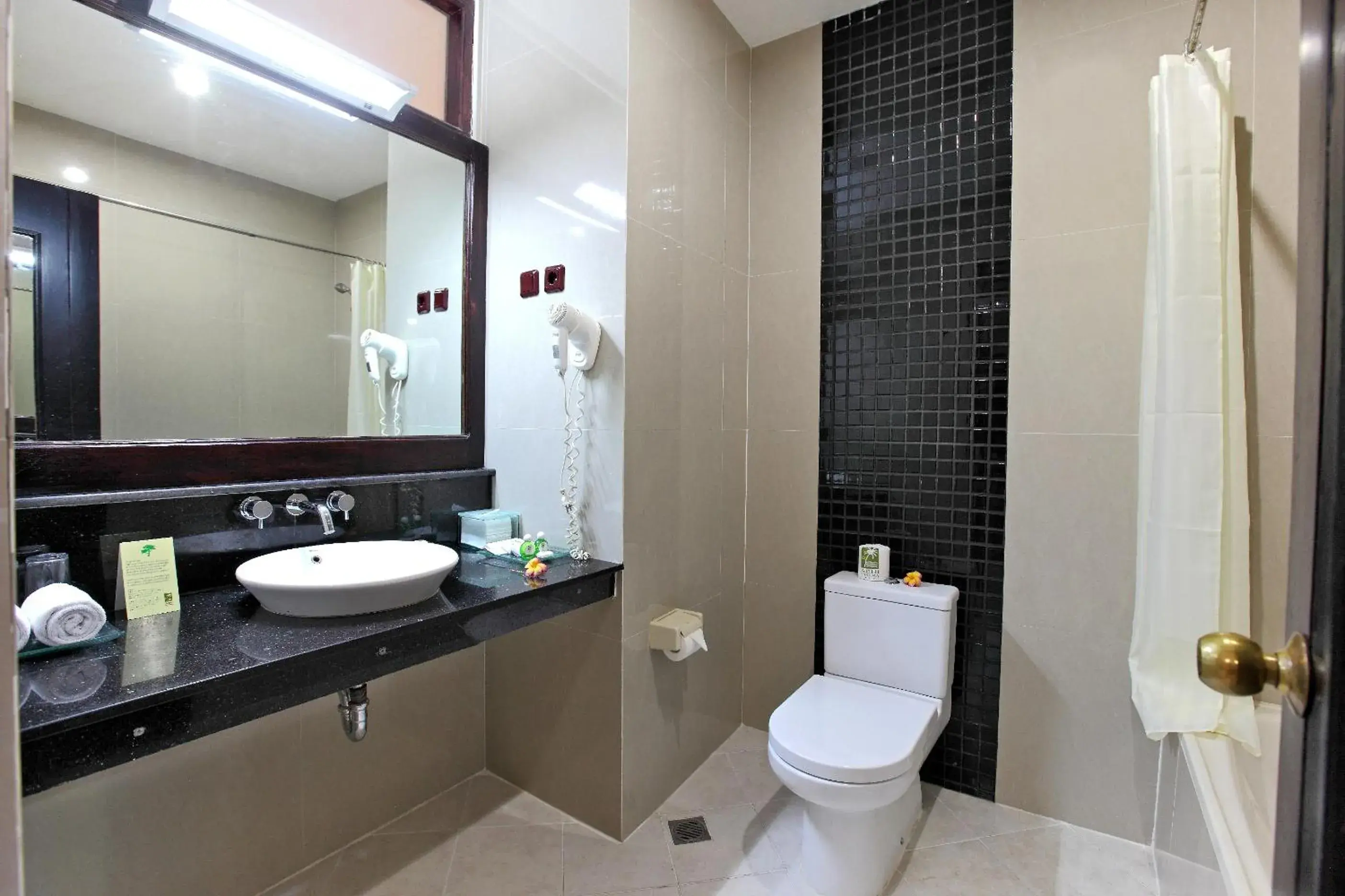 Bathroom in Adi Dharma Hotel Kuta